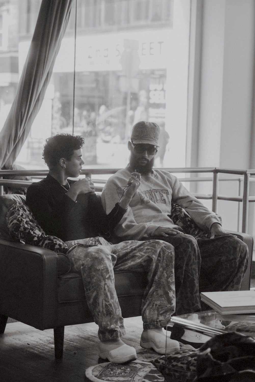 Ish interviewing a client on a chair