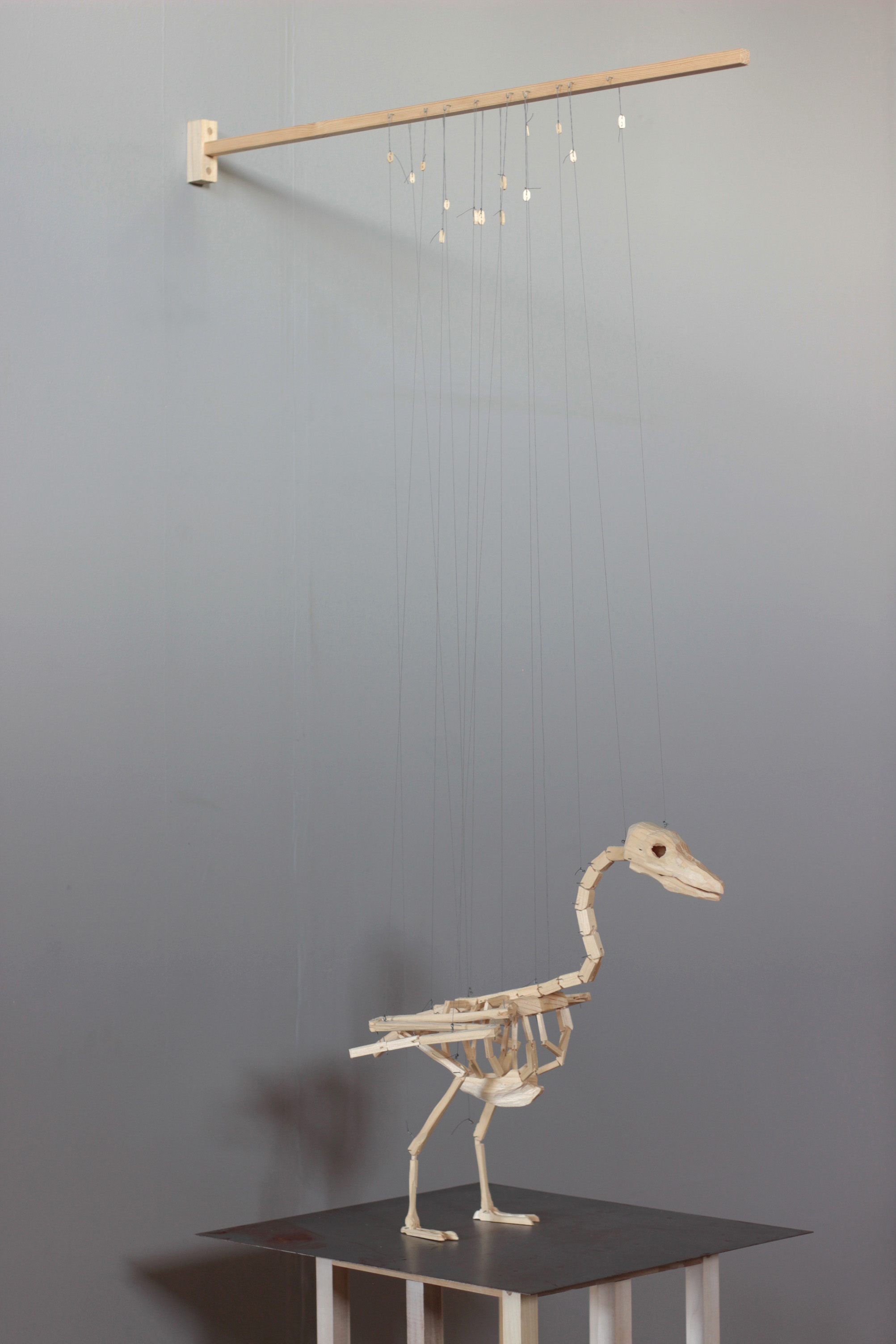 The Fear is Real Today. 2023. Pine wood, thread, steel wire, 122 x 30 x 50cm