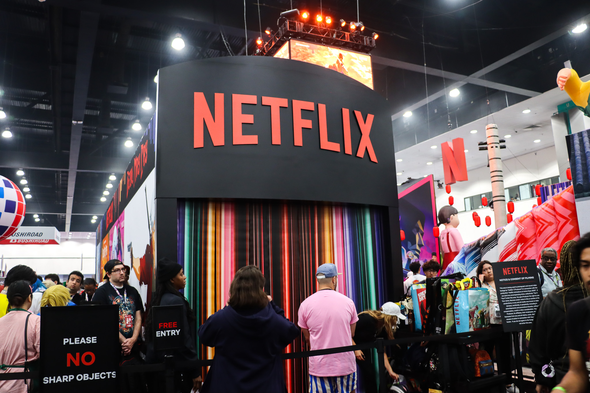 ENTRANCE: Funhouse entrance with "Netflix Rain" curtain