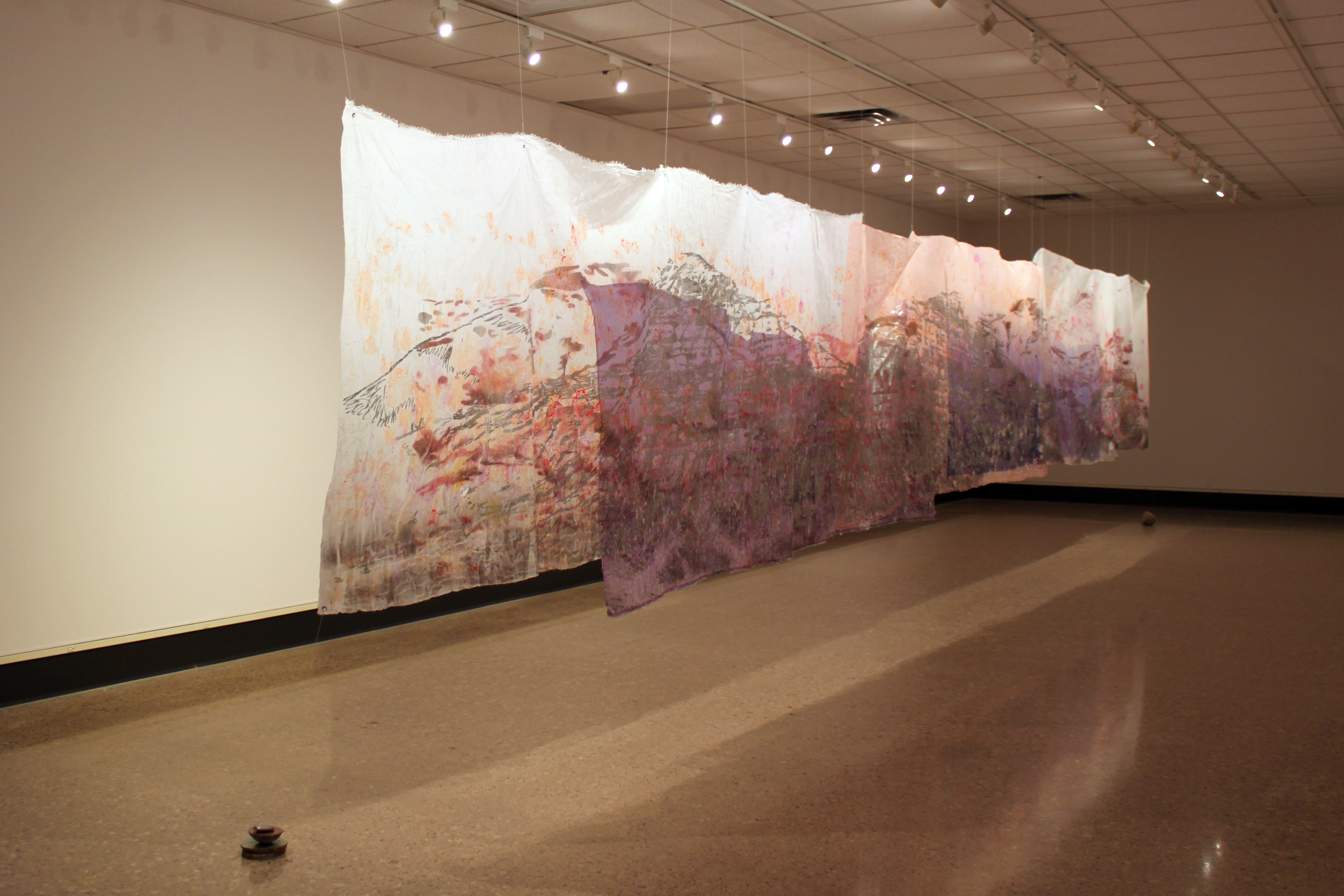 Between Crystalline Peaks acrylic, hot-pressed foil, oil and spray paint on fabric, rocks and aluminum 3 x 50 feet