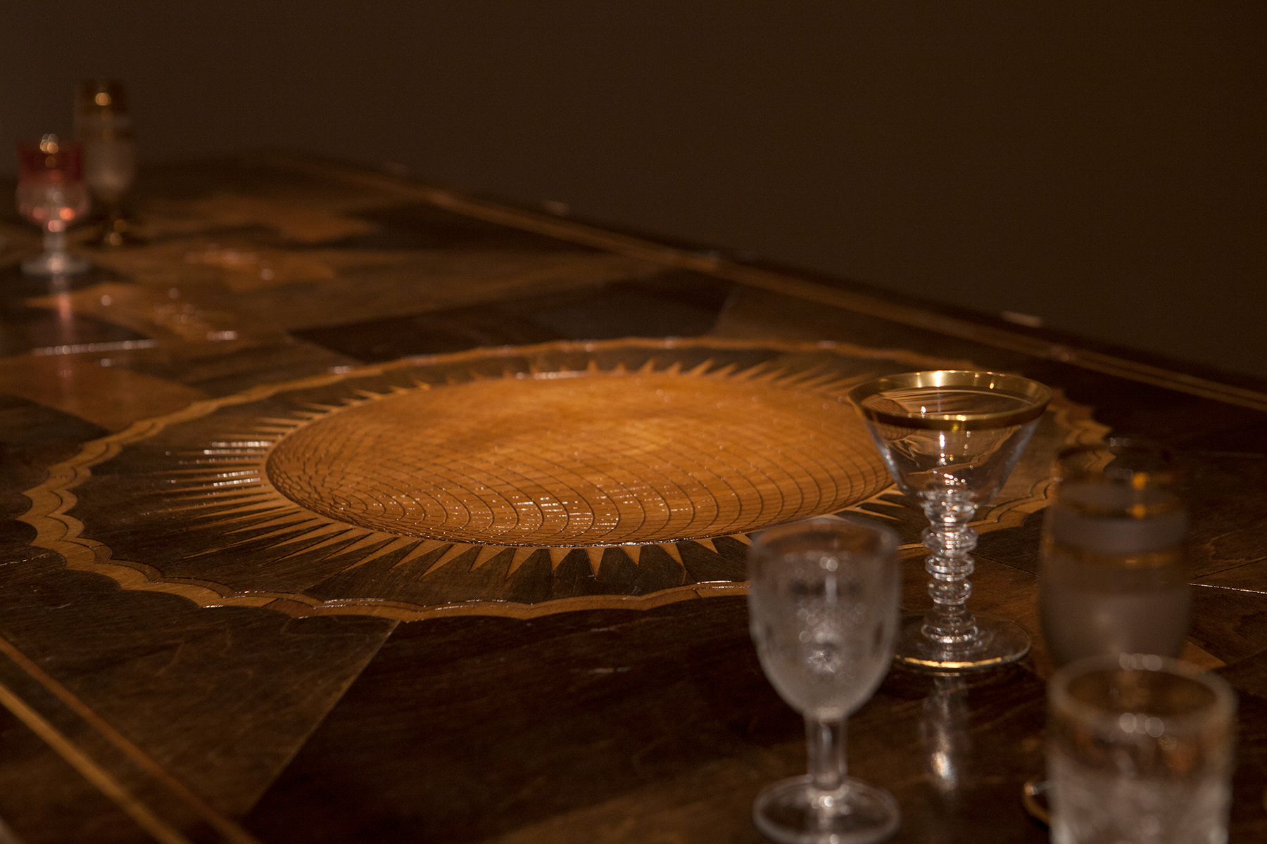 detail of disco-ball design in marquetry