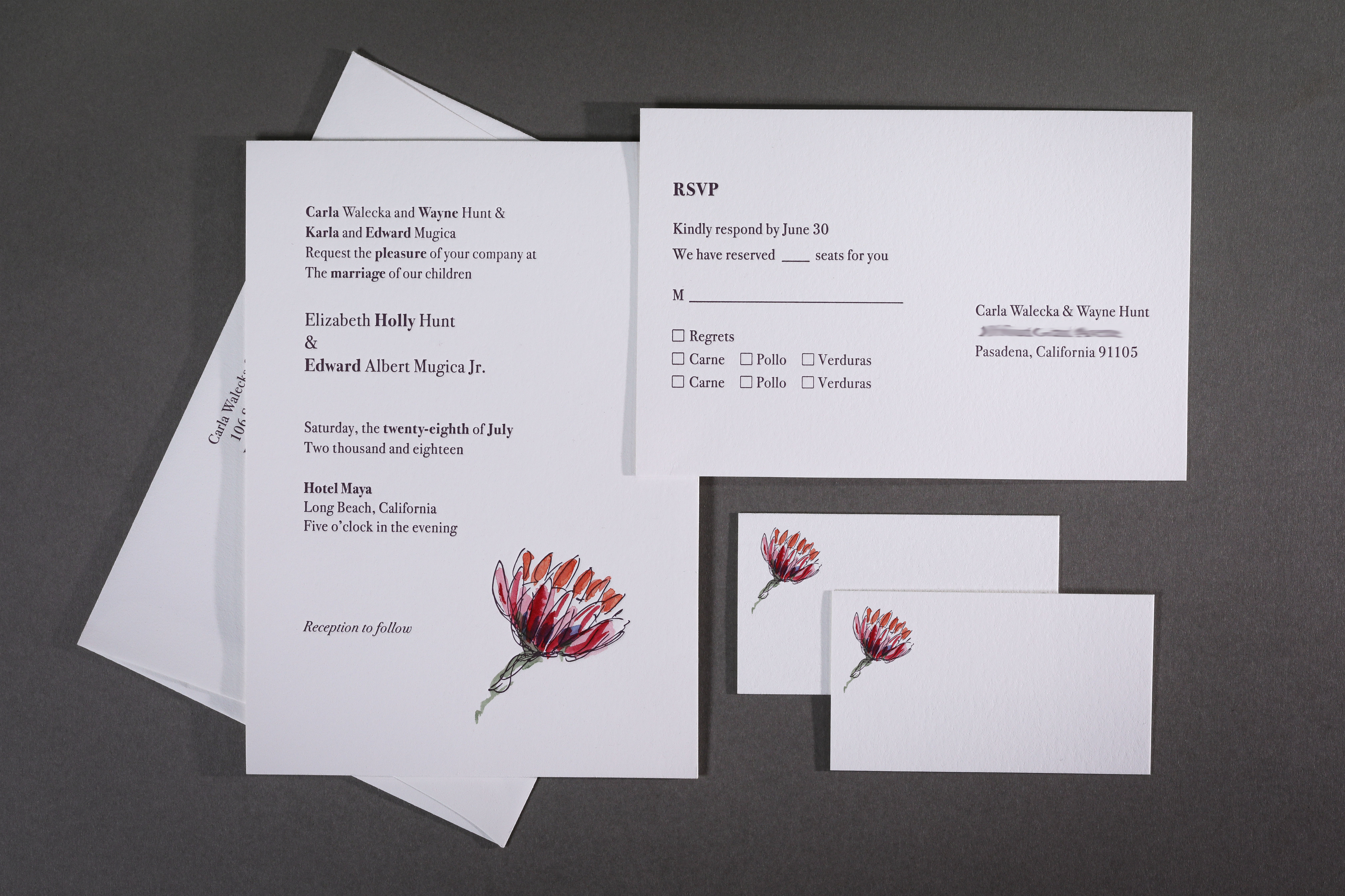 Holly & Edward wedding invitation.Letterpress dark purple ink and hand water colored flowers as a finishing touch by bride's father.Paper Savoy in natural white