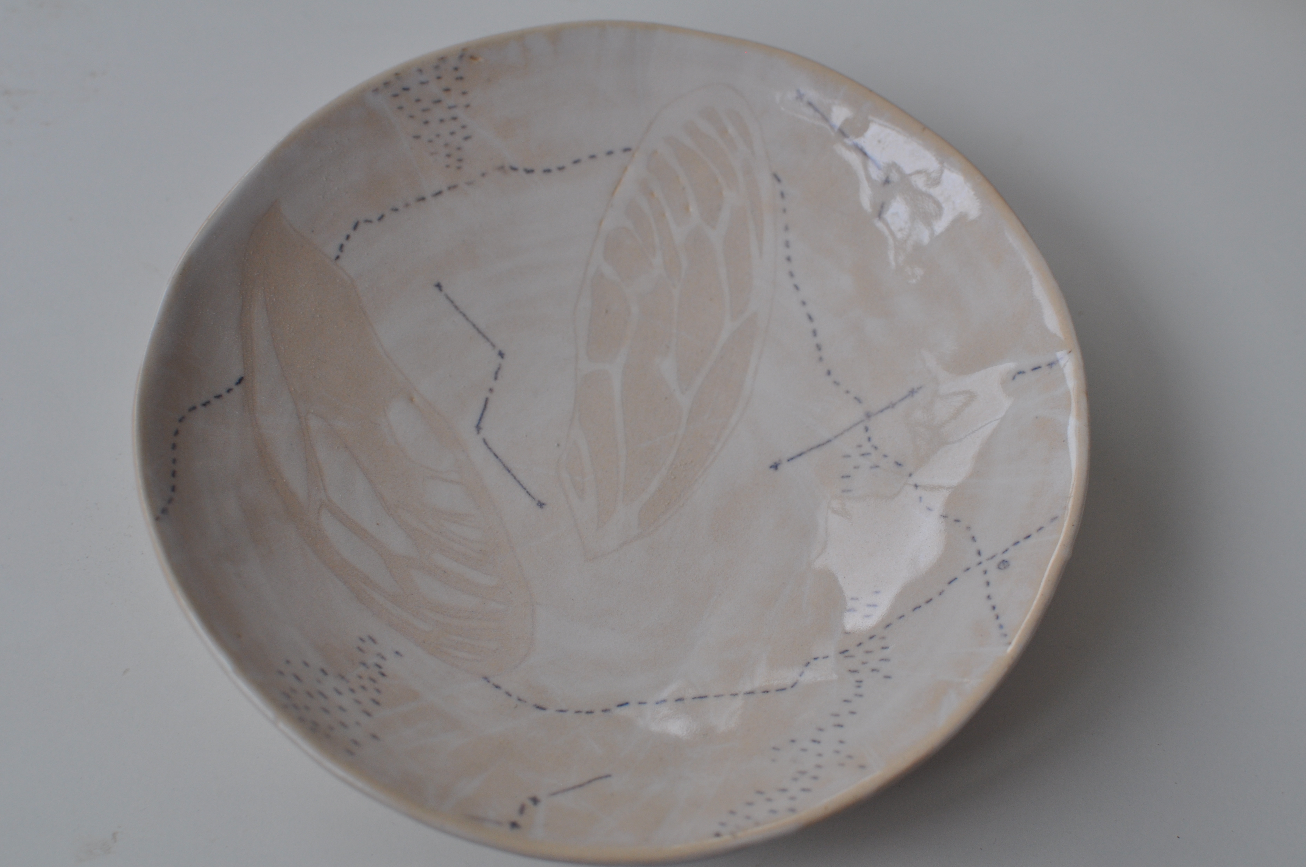 Polilla plates. High-temperature ceramics. Hand made. Painted with porcelain slip, colors and black ceramic pencil. Barcelona 2015