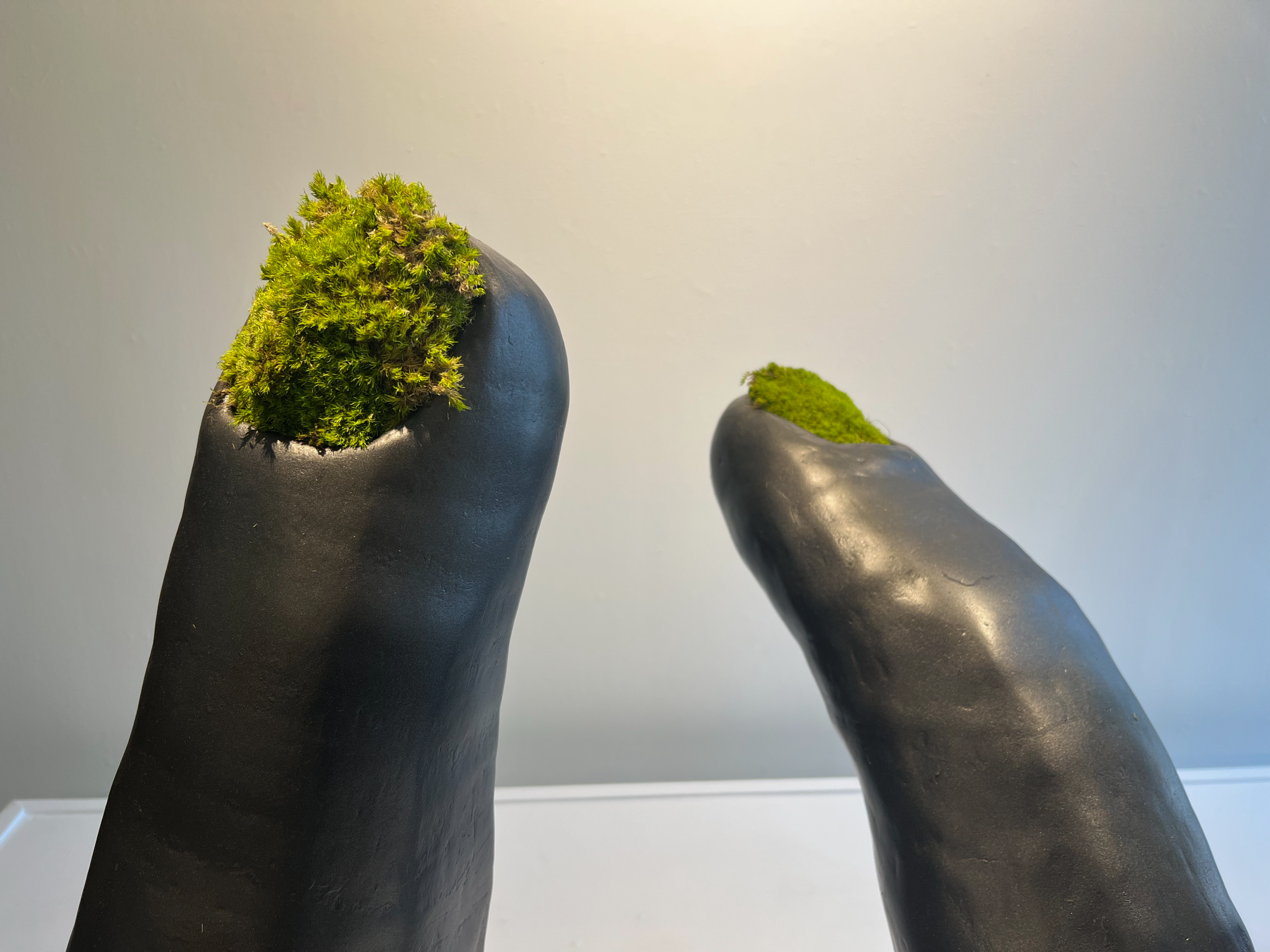 Playing Dress Up (Painted Fingernails) #1-5. 2020–21. Each piece approx. 14 x 36 x 9 inches. Earthenware, epoxy paste, enamel paint, moss.