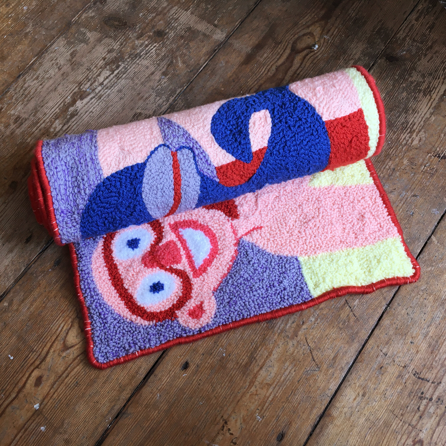 Delfin und Taucher (2021) Hand knotted wall hanging, 49 x 135 cm