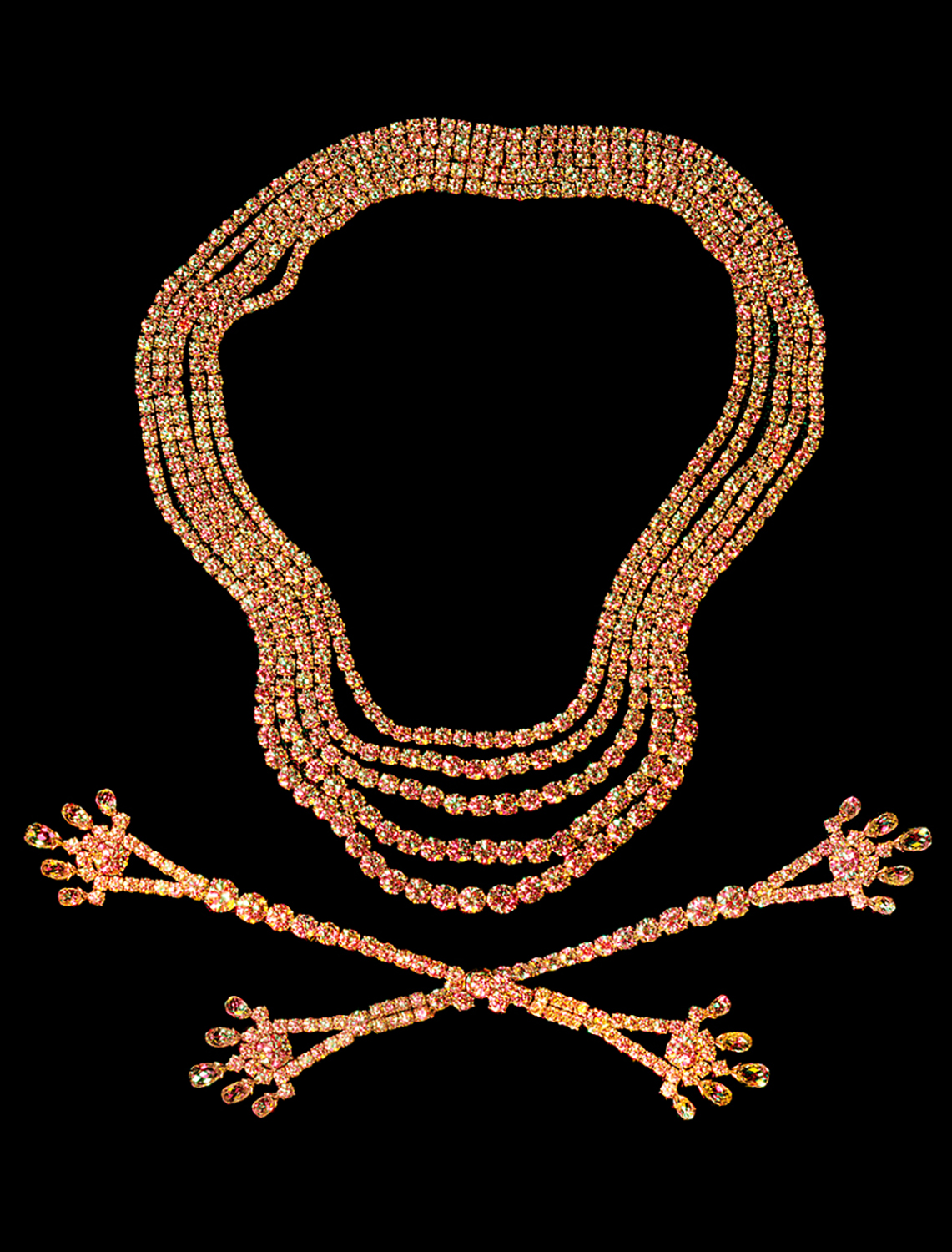 KMA photographer Isabelle Bonjean shoots photograph of a pink and gold necklace on black background for Citizen K