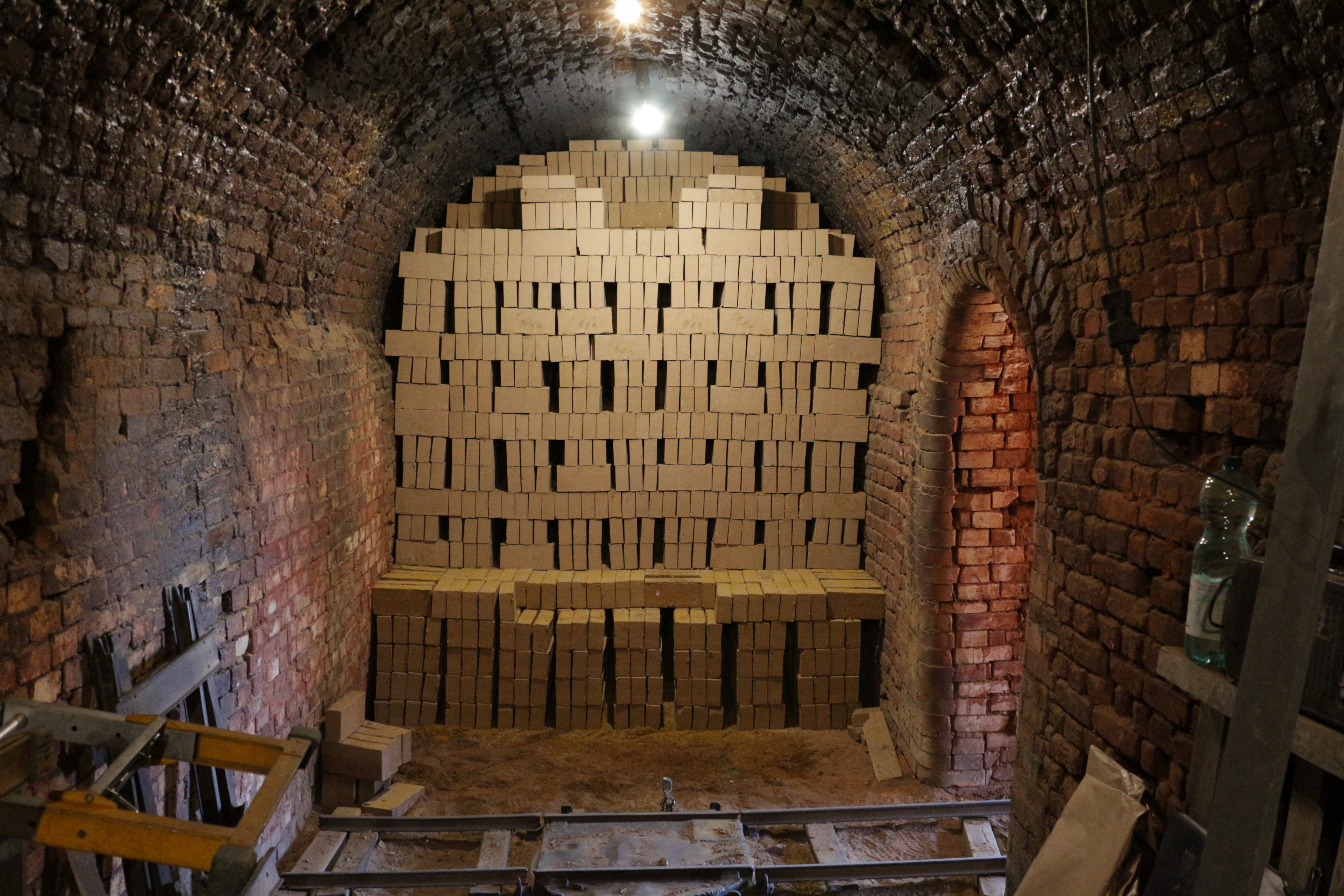 In the tunnel, bricks are stacked in a way that air can circulate through