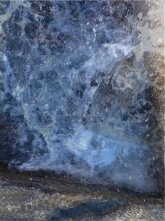 The Storm: The hard winds make the water so busy you can barely hear the surrounding noises over the sounds from the sea. Waves smash into the rock walls splashing water up in the air and over the concrete edge. 