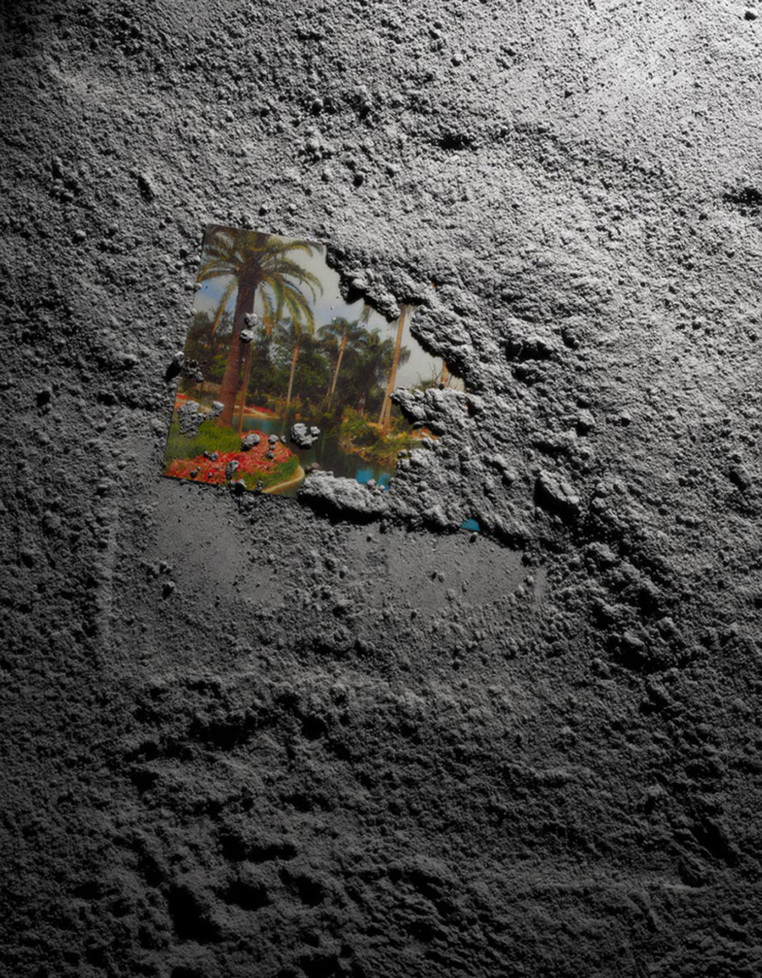 KMA stylist Sara Wacksman designs set for a photo of a photo laying in grey dirt for Pan & The Dream