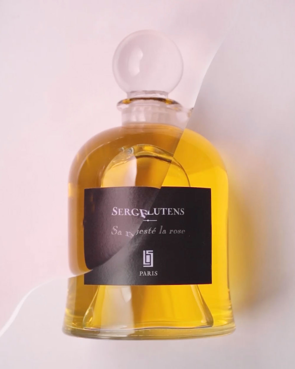 KMA photographer Vincent Gapaillard photographs a broken bright yellow perfume bottle for Carton