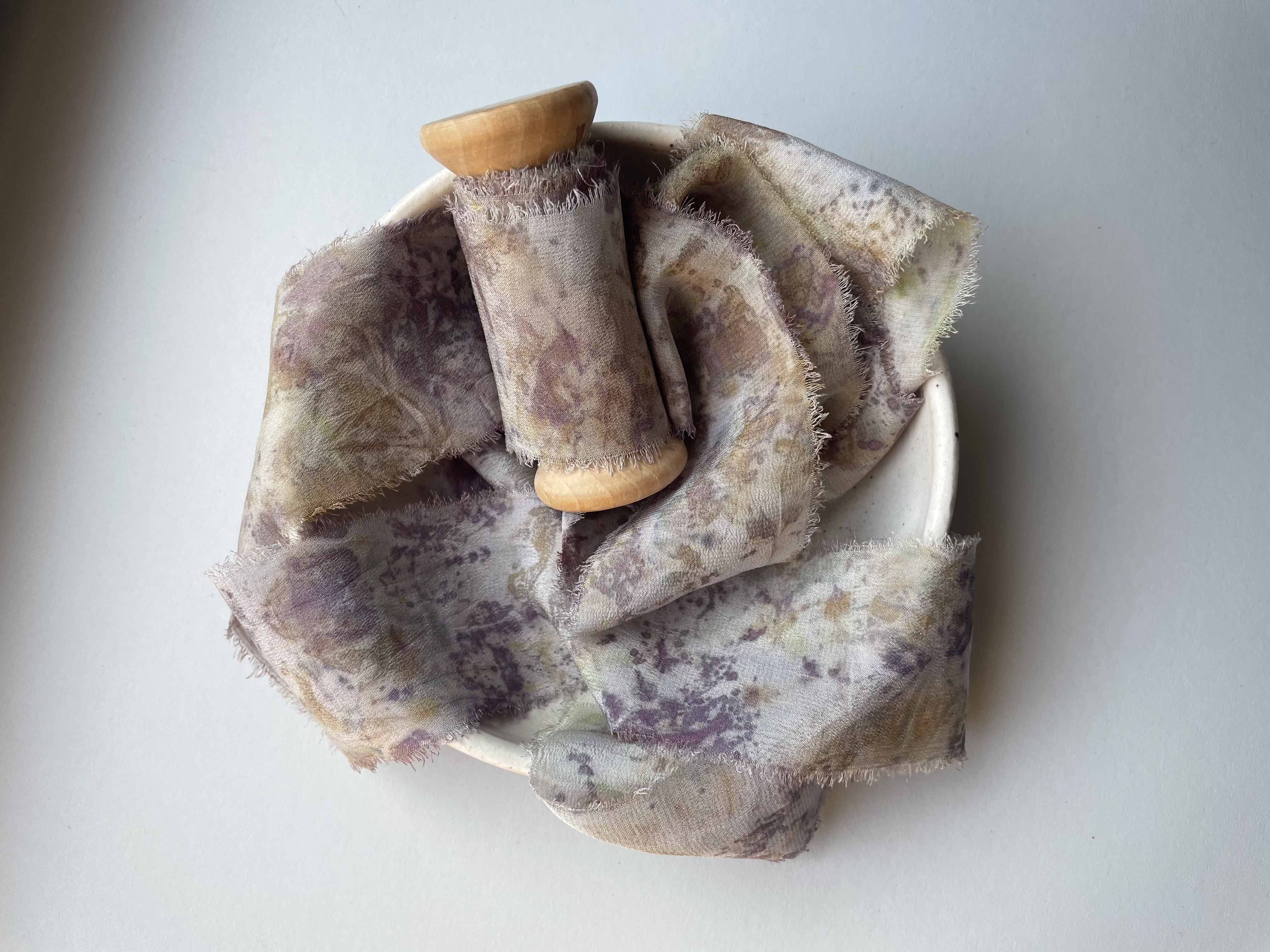 Silk ribbon for wedding bouquet dyed with roses and eucalyptus.