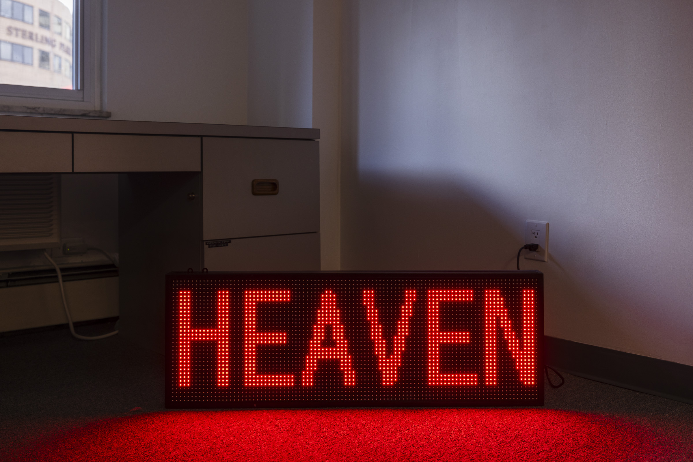 Beautiful Sexy Angels Await You in Heaven, 2025. Scrolling text on LED screen, 13 &frac34; x 39 x 2 ⅛ in, 34.9 x 99.06 x 5.5 cm. Photo: Chris Uhren 