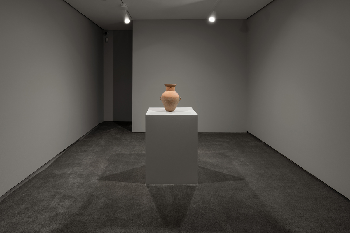 James Webb, A series of personal questions addressed to a Neolithic Clay Vessel from the Upper Yellow River Region (2024) | Qijia amphora, speaker, audio | Installation view at Astrup Fearnley Museum, OsloIn this ongoing series, the artist literally poses spoken questions to selected objects and environments as if they were sentient beings able to respond. The installation takes the form of audio speakers installed above where the audience would ideally be situated in relation to the object or space. Each set of questions is written specifically for the chosen interview subject. No answers are written, given, or suggested, and a pause of approximately 10-seconds is taken between each question. In this pause, the object can be thought of as being in a state of response. Here too, the audience is also free to consider their own replies to the questions.