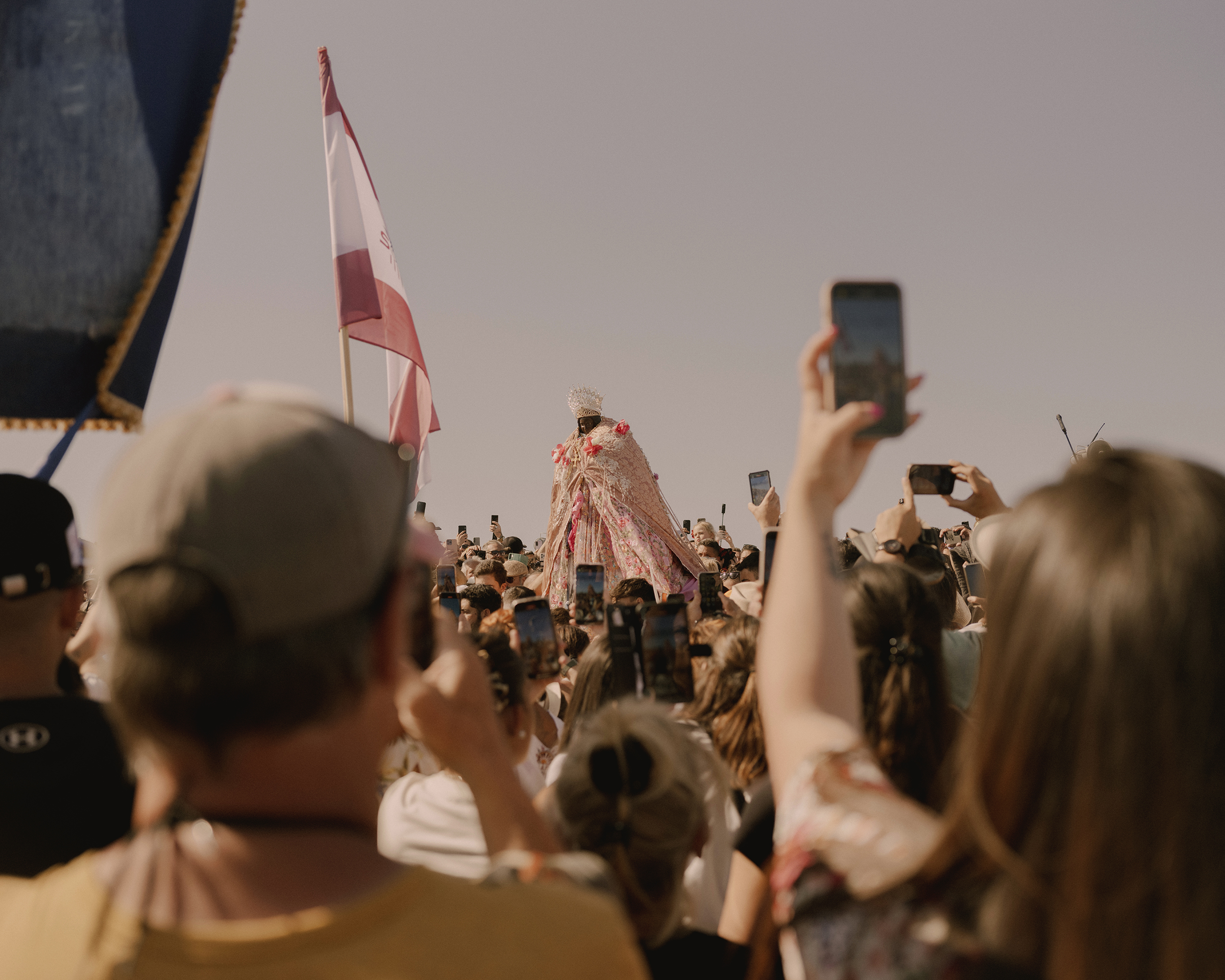 The procession watches as Saint Sara is carried into the sea