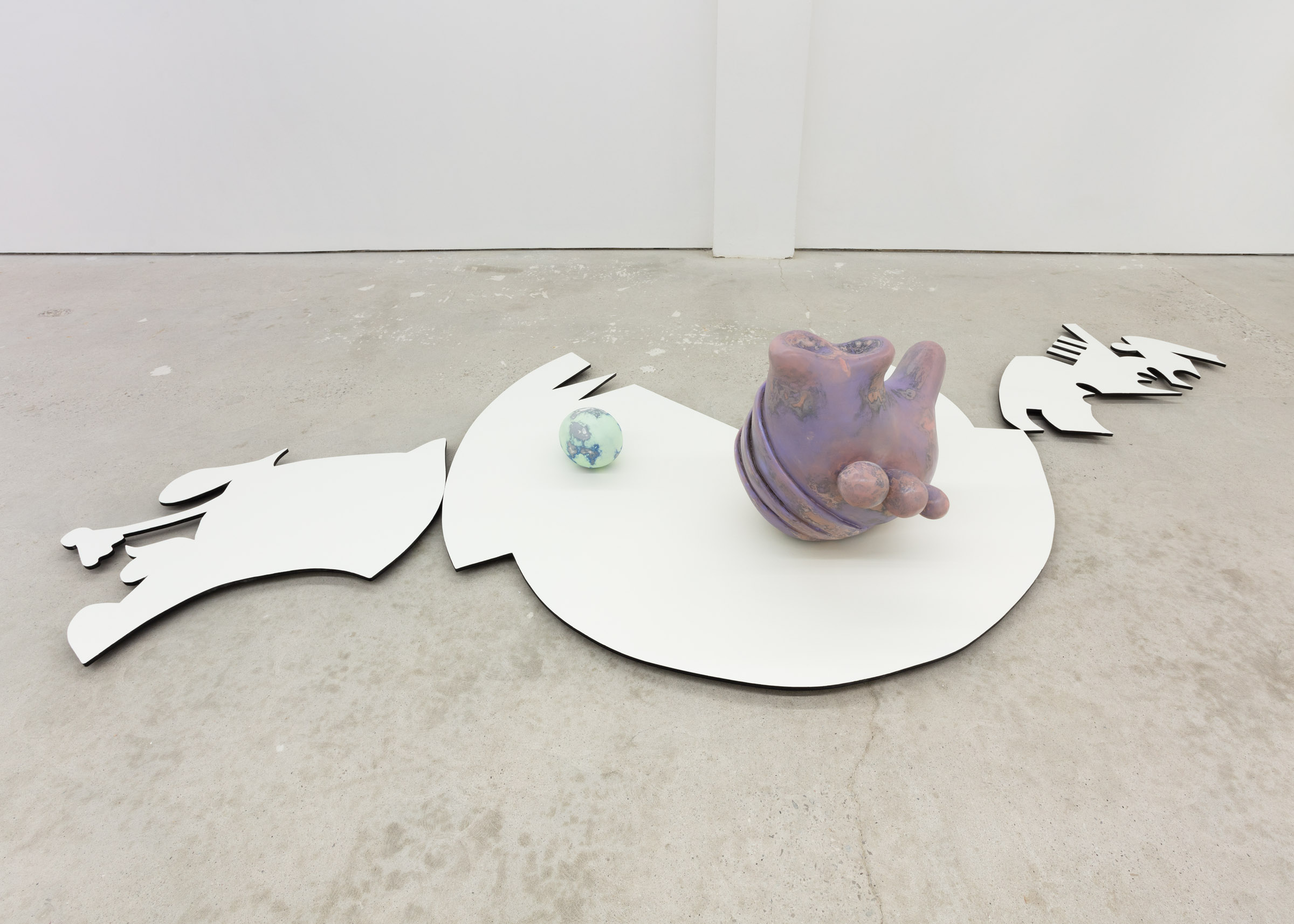 Left to Right: Meghan Harder 'Egg (blue morph)' 2021-2022 insulation foam, Bondo, spackle, acrylic and spray paint 'Distlefink (pink morph)' 2021-2023 insulation foam