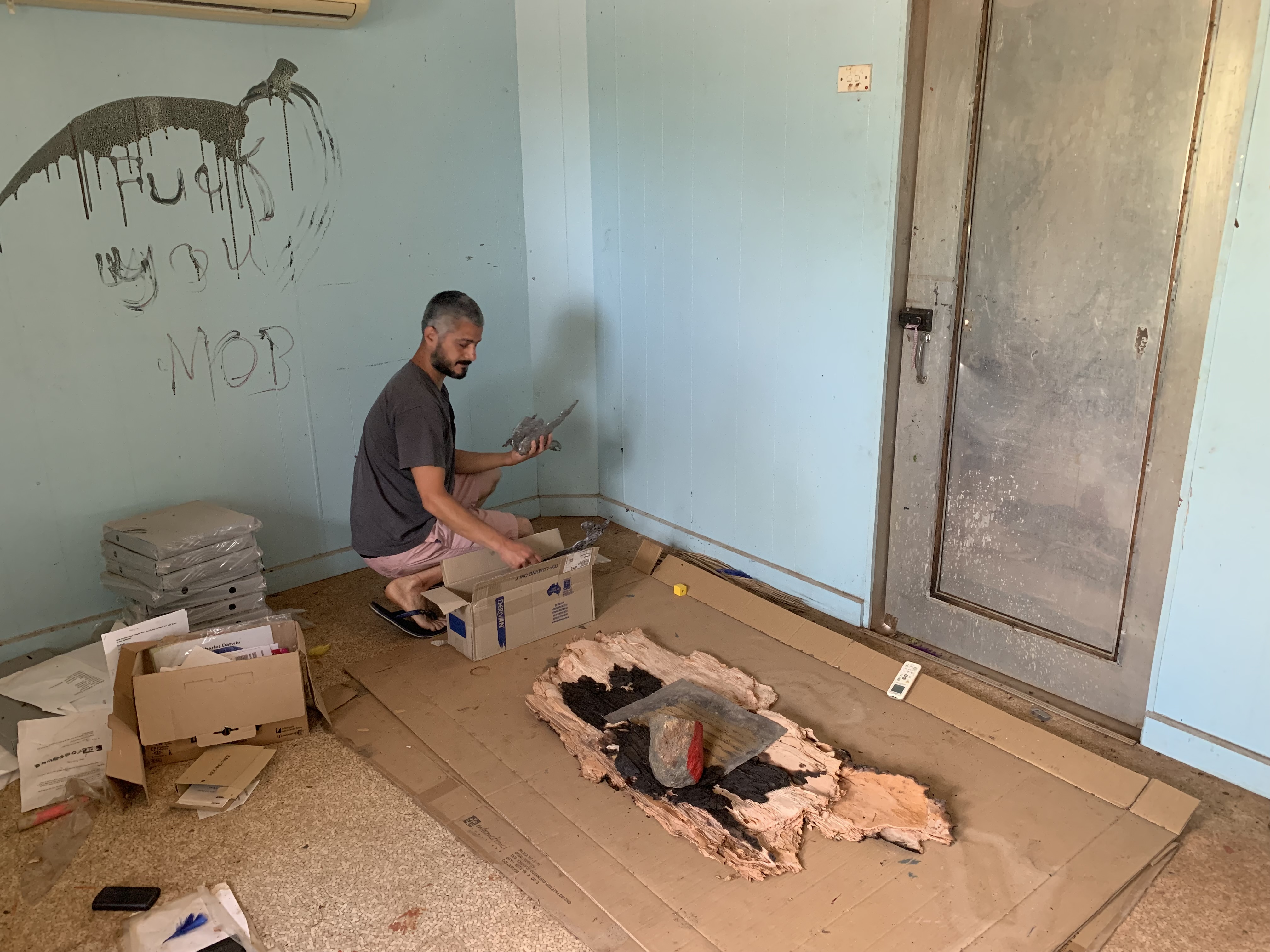 Giuseppe Lana experimenting at the Art Centre during a studio-practice led by Regina Pilawuk Wilson. Durrmu Arts Aboriginal Corporation, Peppimenarti, Northern Territory, Australia. September 2019. Photo Miriam La Rosa