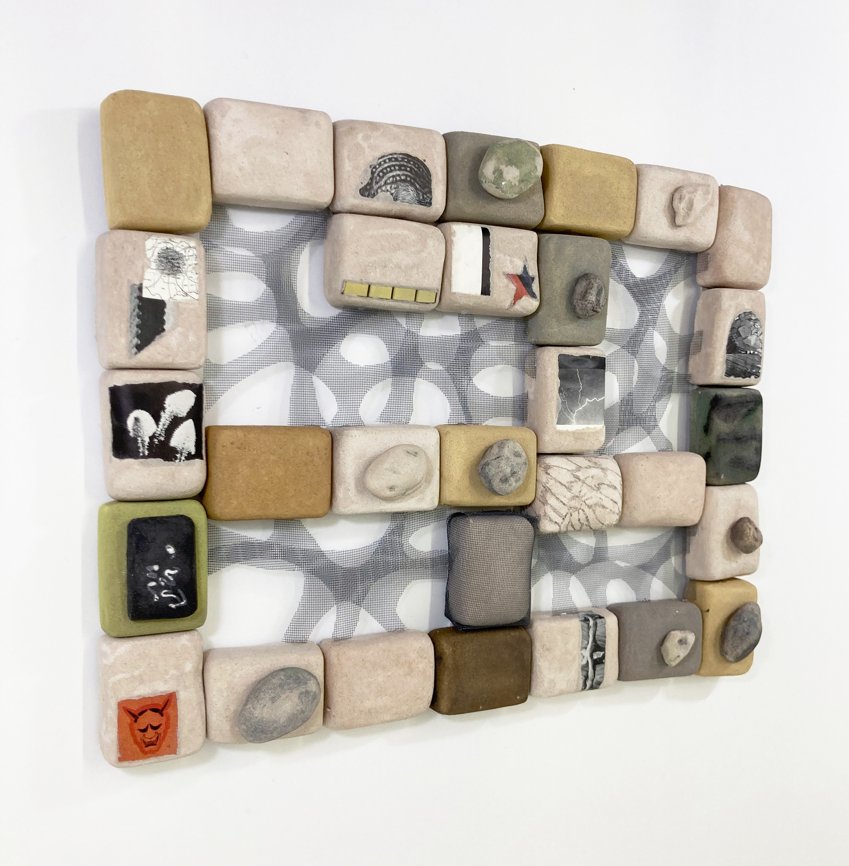 Infrastructure Reboot (Dreaming Stone, Dreaming Bone), 2023, Aluminum mesh, aquaresin, wood, oil paint, chalk pastel, graphite, and collage 22" x 18" x 3"