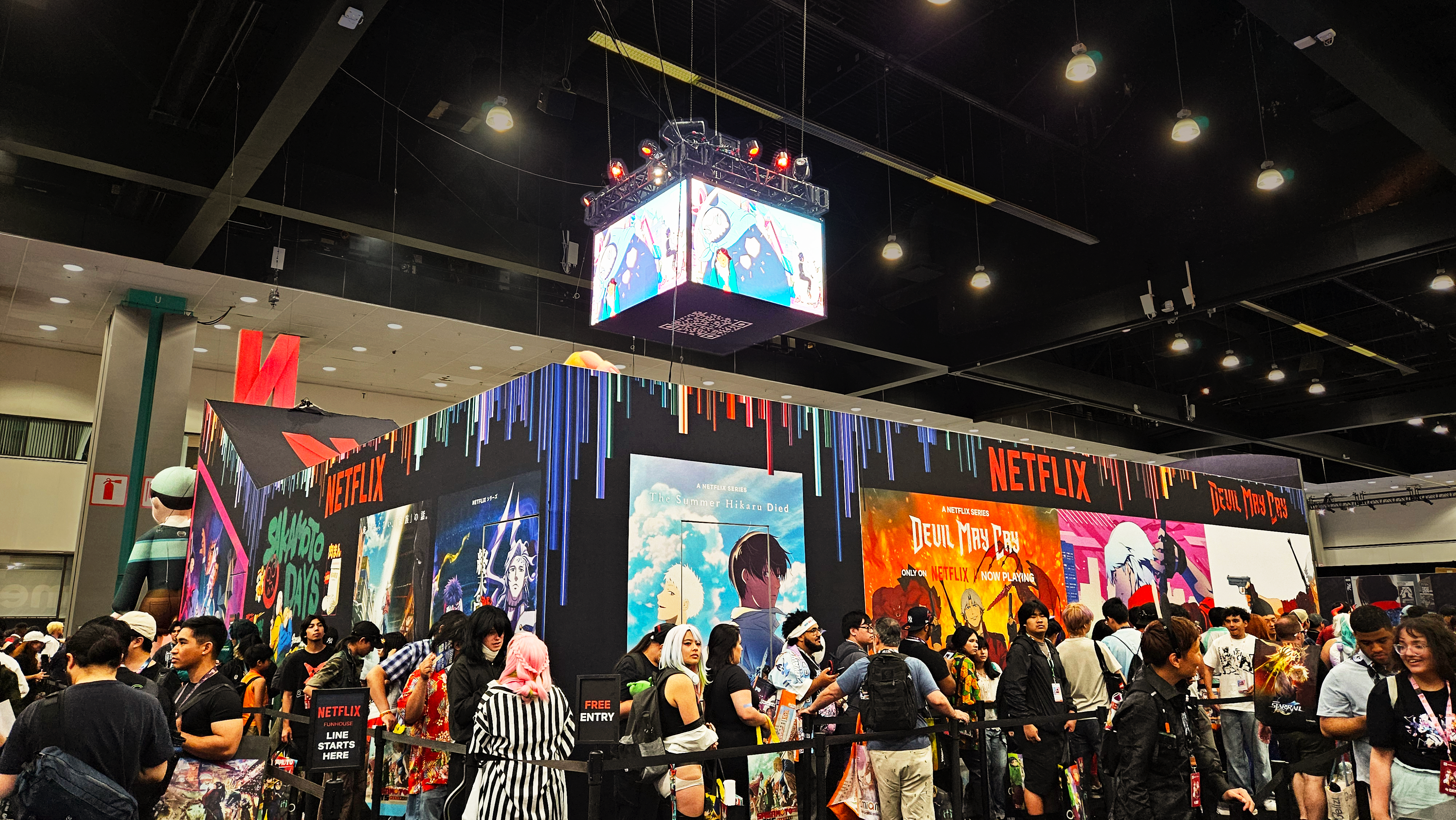 BACK OF THE FUNHOUSE: Relevant anime posters and decals decorated the back of the funhouse, where we wrapped the ever-long line.