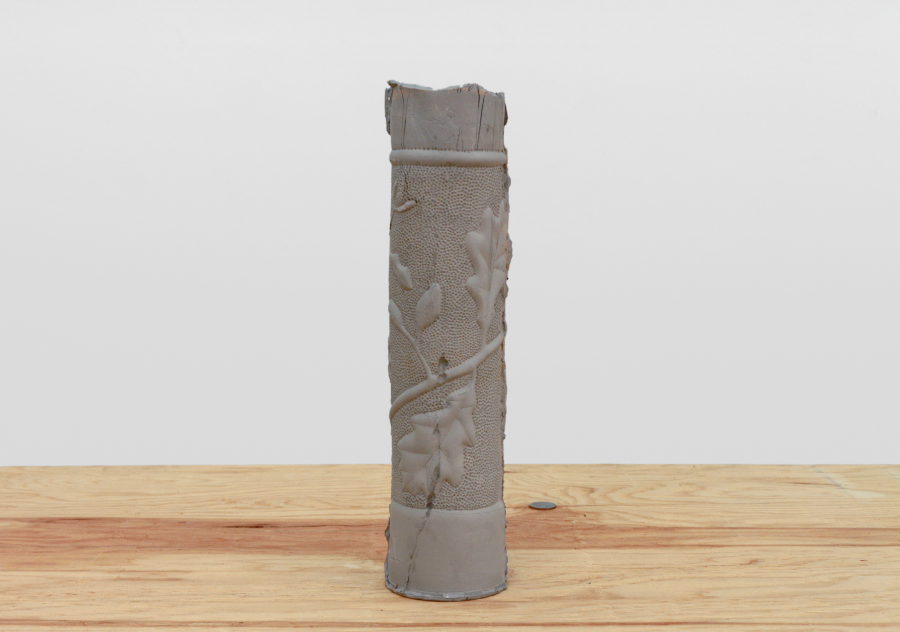 A curse cannot be broken, can only be understood as that which does not break, 2017, slipcasted WWI artillery shell, 19 x 3 x 3 in. (48 x 7 x 7 cm)