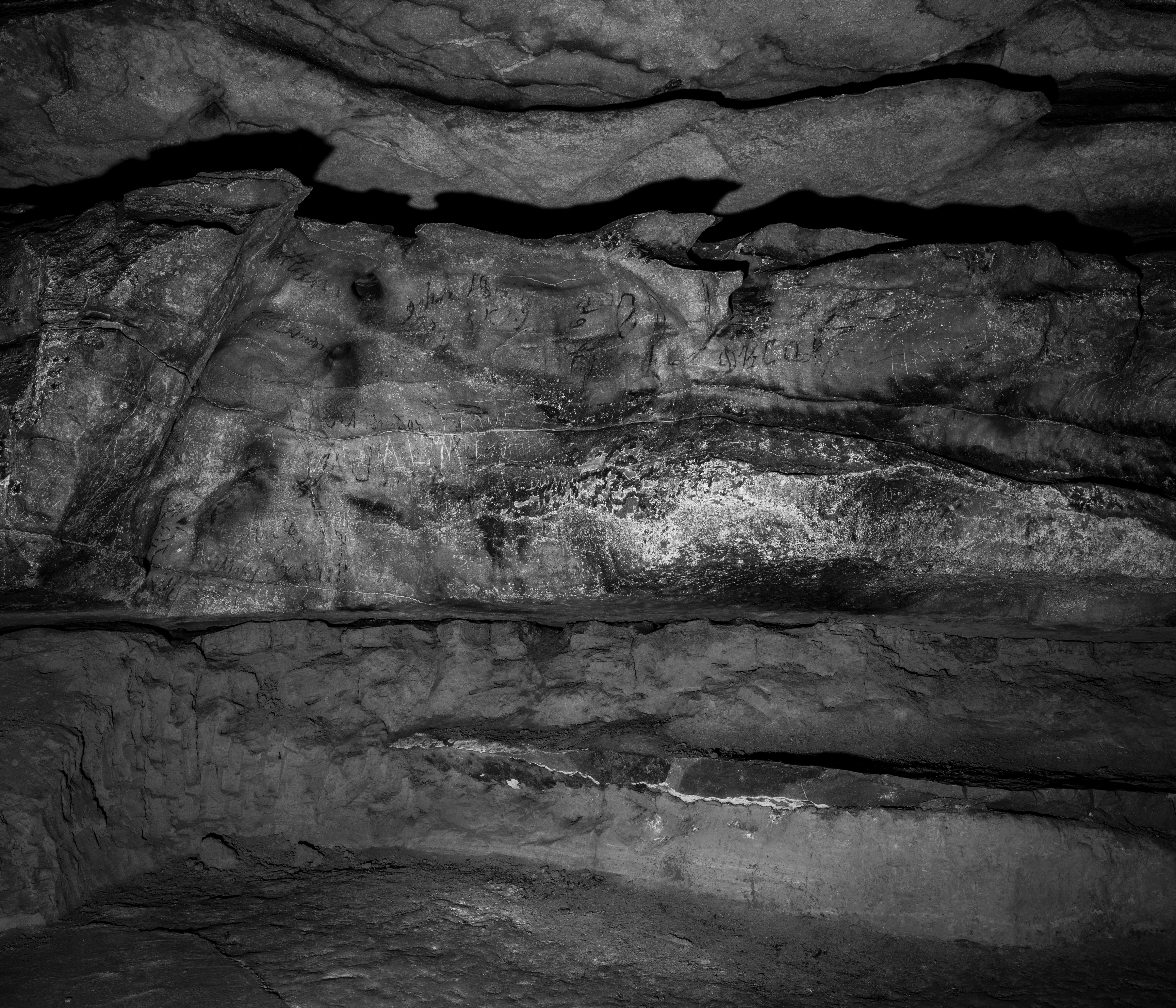 Ft. Payne (formerly Willistown), DeKalb County — Manitou Cave. In 1837 federal troops seized Cherokee property around Willstown and established Fort Payne, a stockade and emigration depot for Indian Removal. The majority of Cherokee in Alabama who were forced to leave their homes by the Indian Removal Act of 1830 were interned at Fort Payne. By October of 1838, less than a year after the fort’s establishment, a detachment of 1,100 Cherokee led by Cherokee conductor John Benge departed for Indian Territory and the fort closed soon after. Inside Manitou, traces of human activity date back 10,000 years. The cave includes sacred inscriptions written in Cherokee syllabary, which was invented by Sequoyah while he lived in Willstown in the early 1800s. After Indian removal the cave was used as a Confederate encampment and saltpeter mine; by the end of the 19th century industrialists mined the cave for iron and developed the area as a tourist attraction; in the 1920s it was converted into a tourist destination where flappers danced the Charleston in a “ballroom” that featured a wooden dance floor and electric lights; and during the Cold War it was outfitted as a fallout shelter. Through the mid-20th century the site was a roadside attraction but closed after the interstate drew traffic away from Ft. Payne. After decades of neglect the cave is now the focus of grassroots historical and environmental protection.