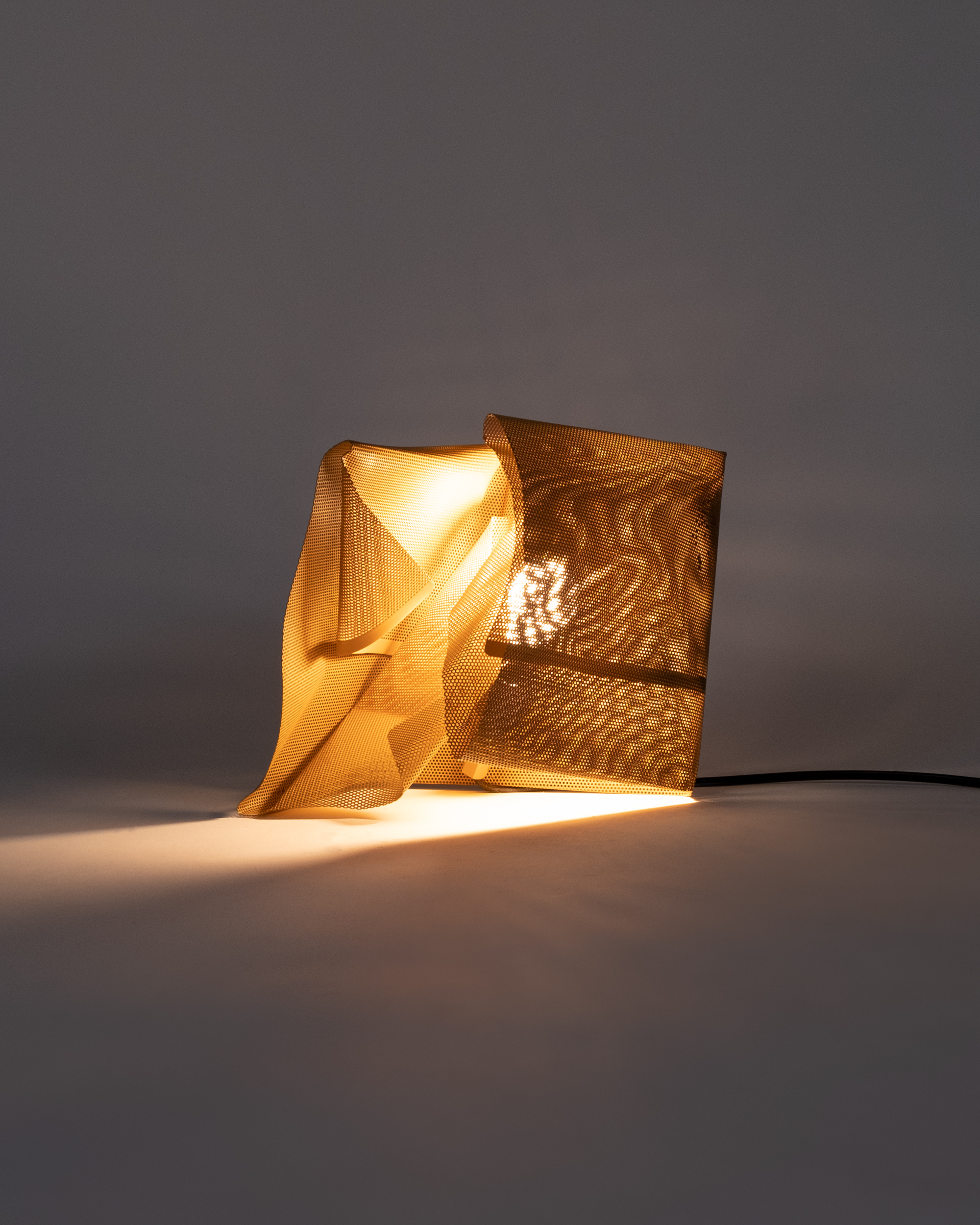 Folded lamp by Liam McClure