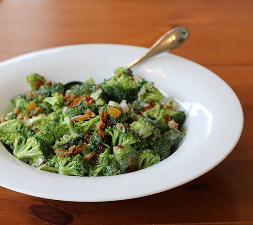 A simple, tasty picture of a bowl of broccoli salad