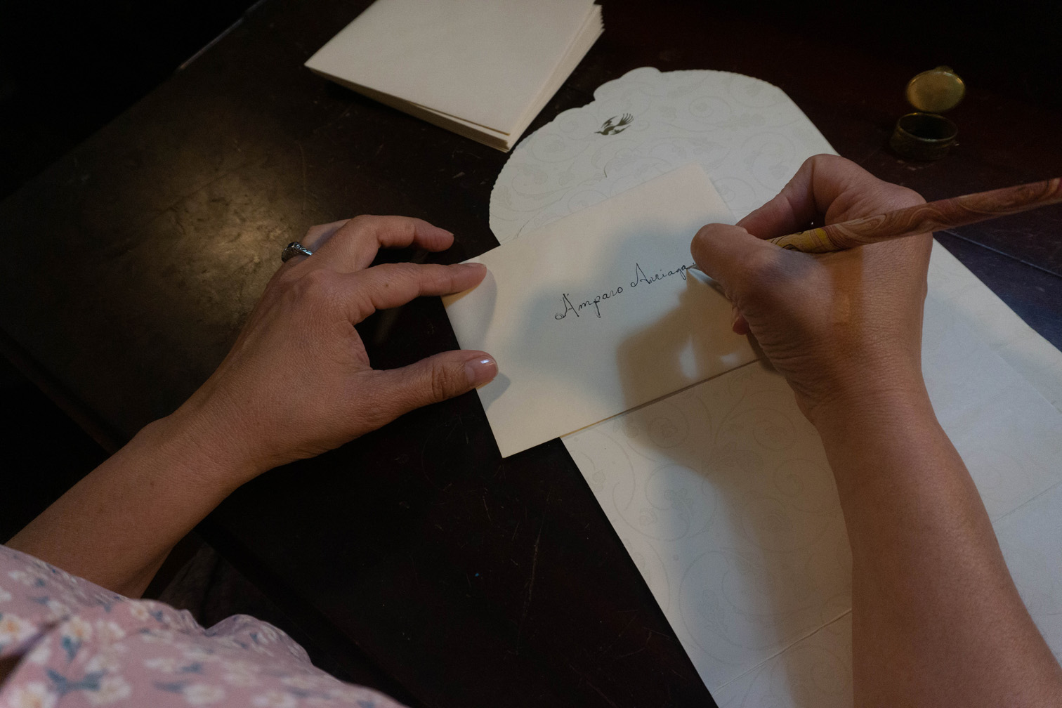 Image 8: Luisa tells Placido that she wants to write each of her adult children a letter since she will not be able to say goodbye to them.