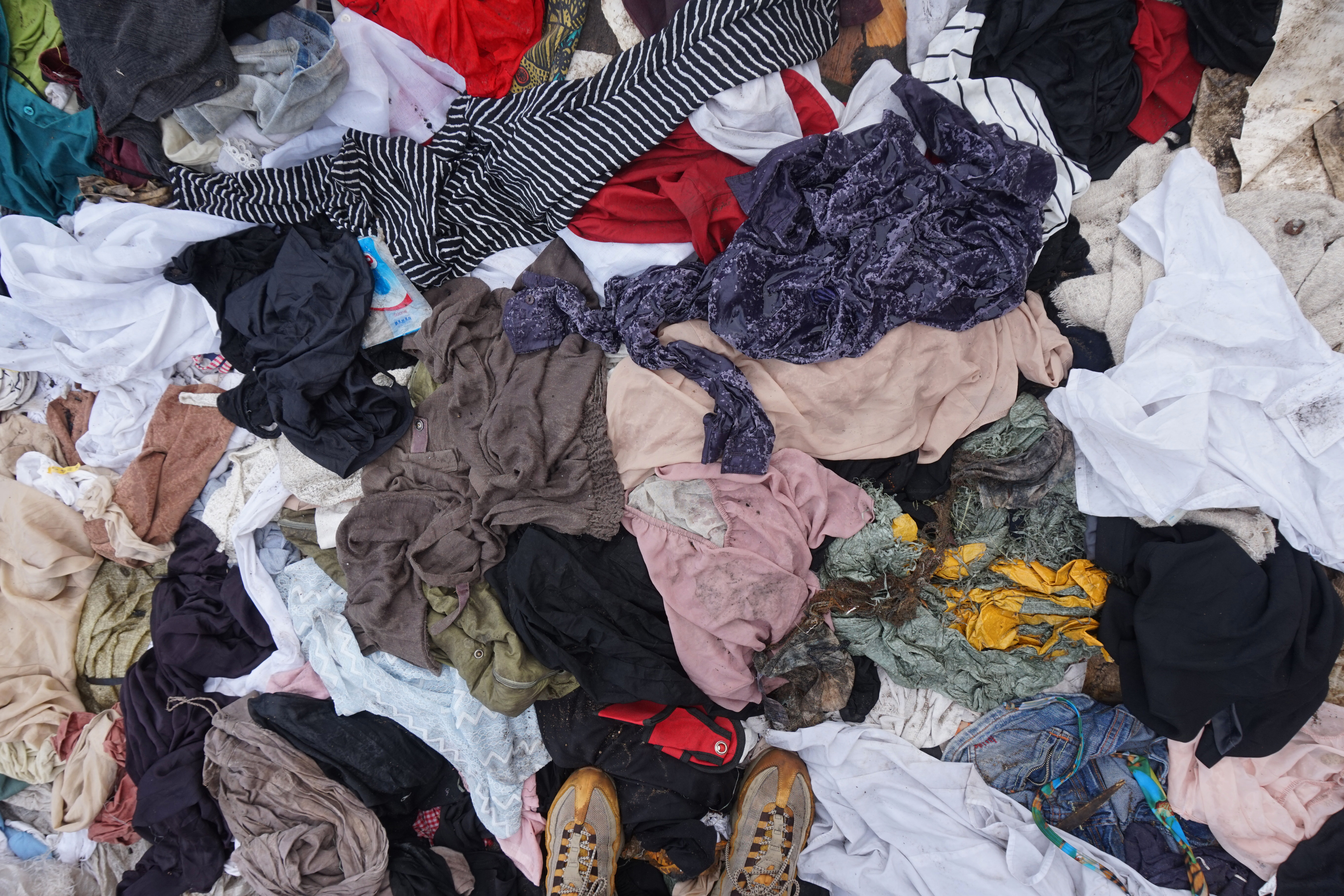 These items have been discarded and are destined for landfill. Around 2 million pounds (possibly more) of clothing is sent to landfill from Kantamanto market on a weekly basis, Accra, 10.07.2018