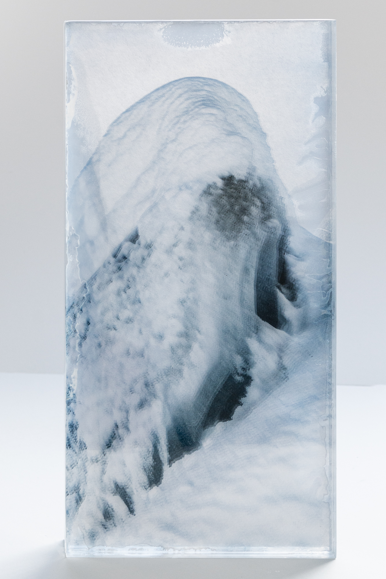 GLACIER #1 | 2024 | UNIQUE PIECE | Layered sculpture, consisting of printed transparents & 10gs washi paper, cast with resin | 56 X 28 X 5 CM