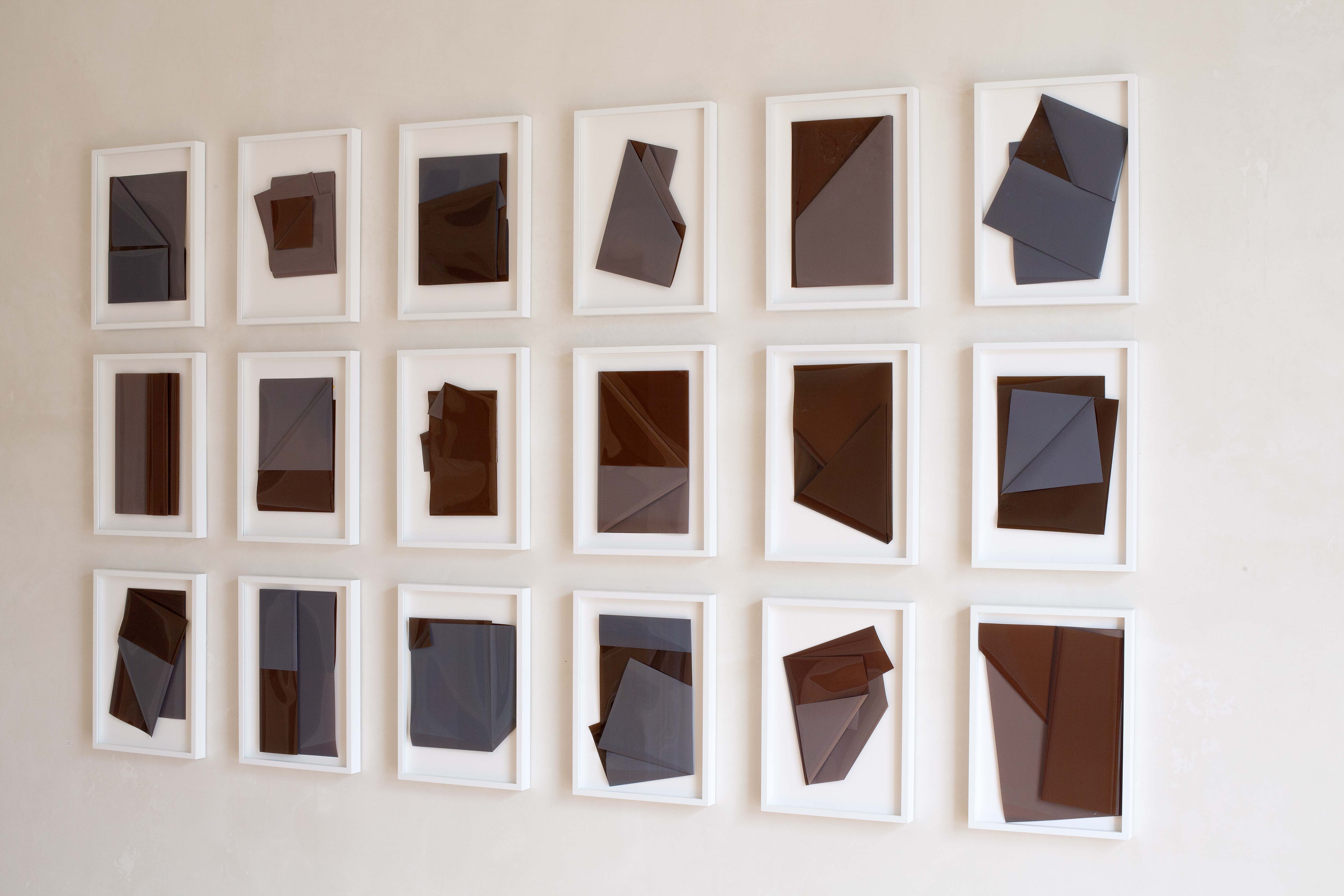 from: folds (2022-24), 21 paper works, glossy photo paper, exposed to daylight, folded, 22x31 cm