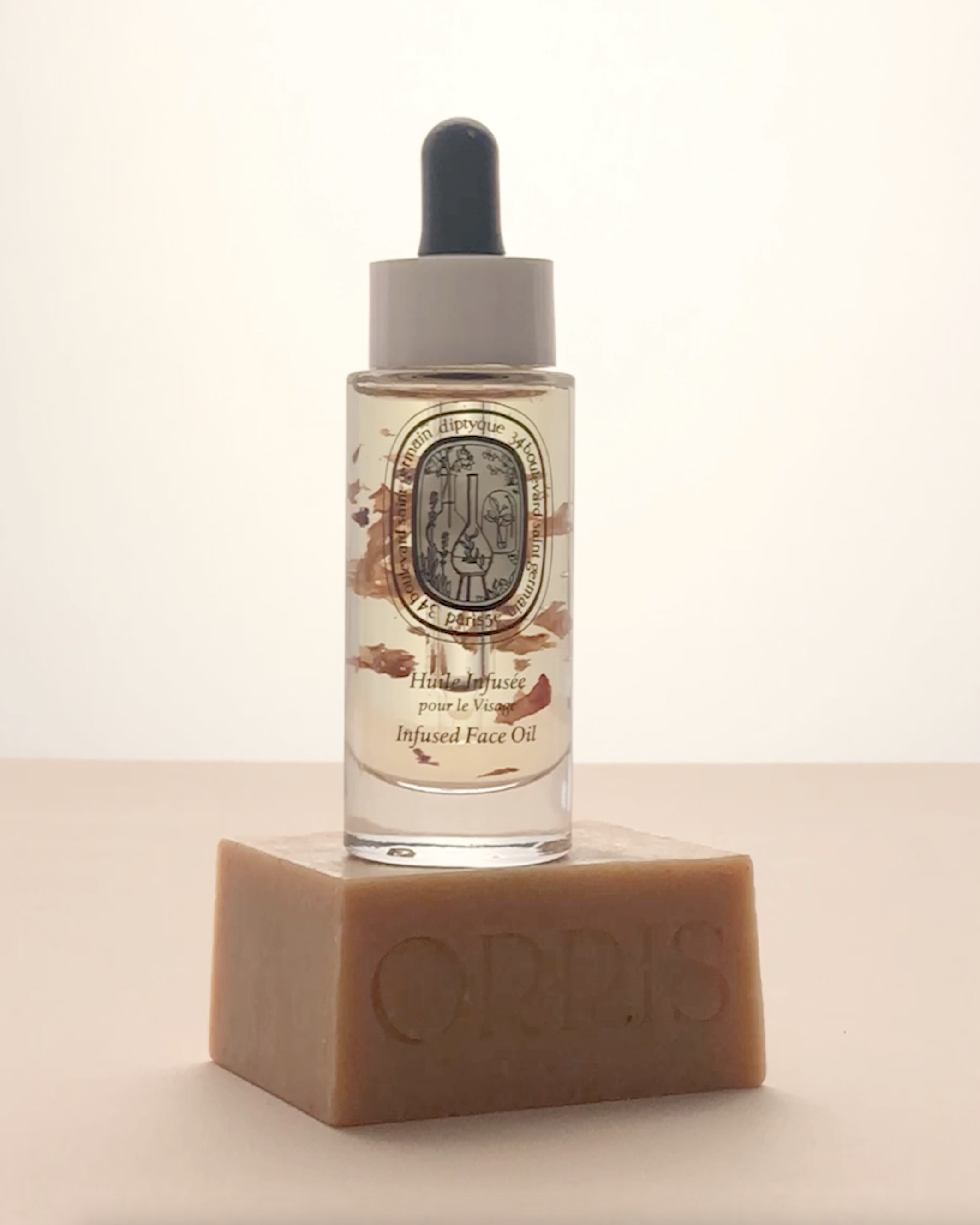 KMA photographer Vincent Gapaillard photographs Dpityque Infused Face Oil sitting on Orris Paris soap