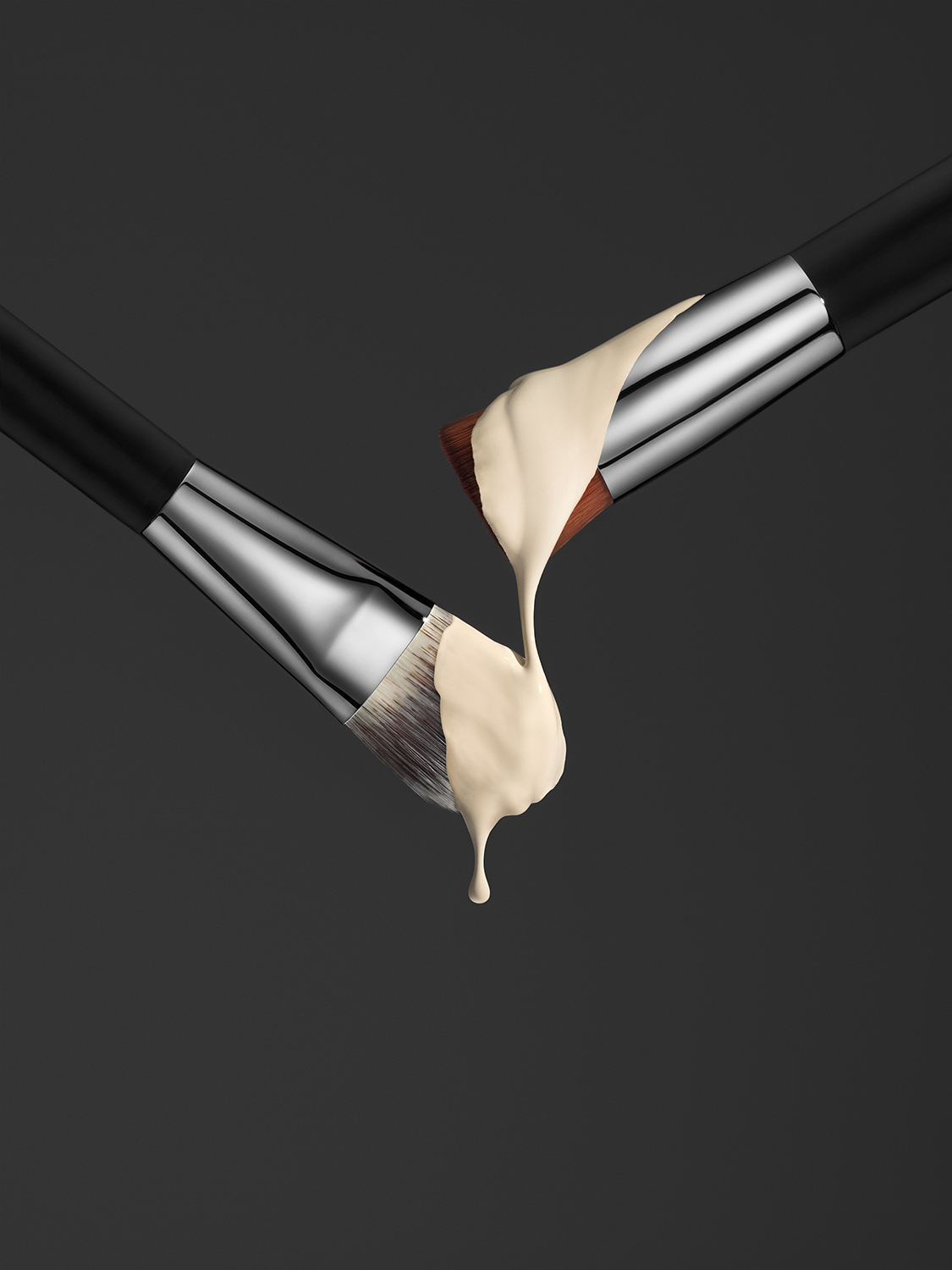 KMA photographer Mattias Nyhlin photographs foundations with foundation drizzle on two face brushes for Douglas