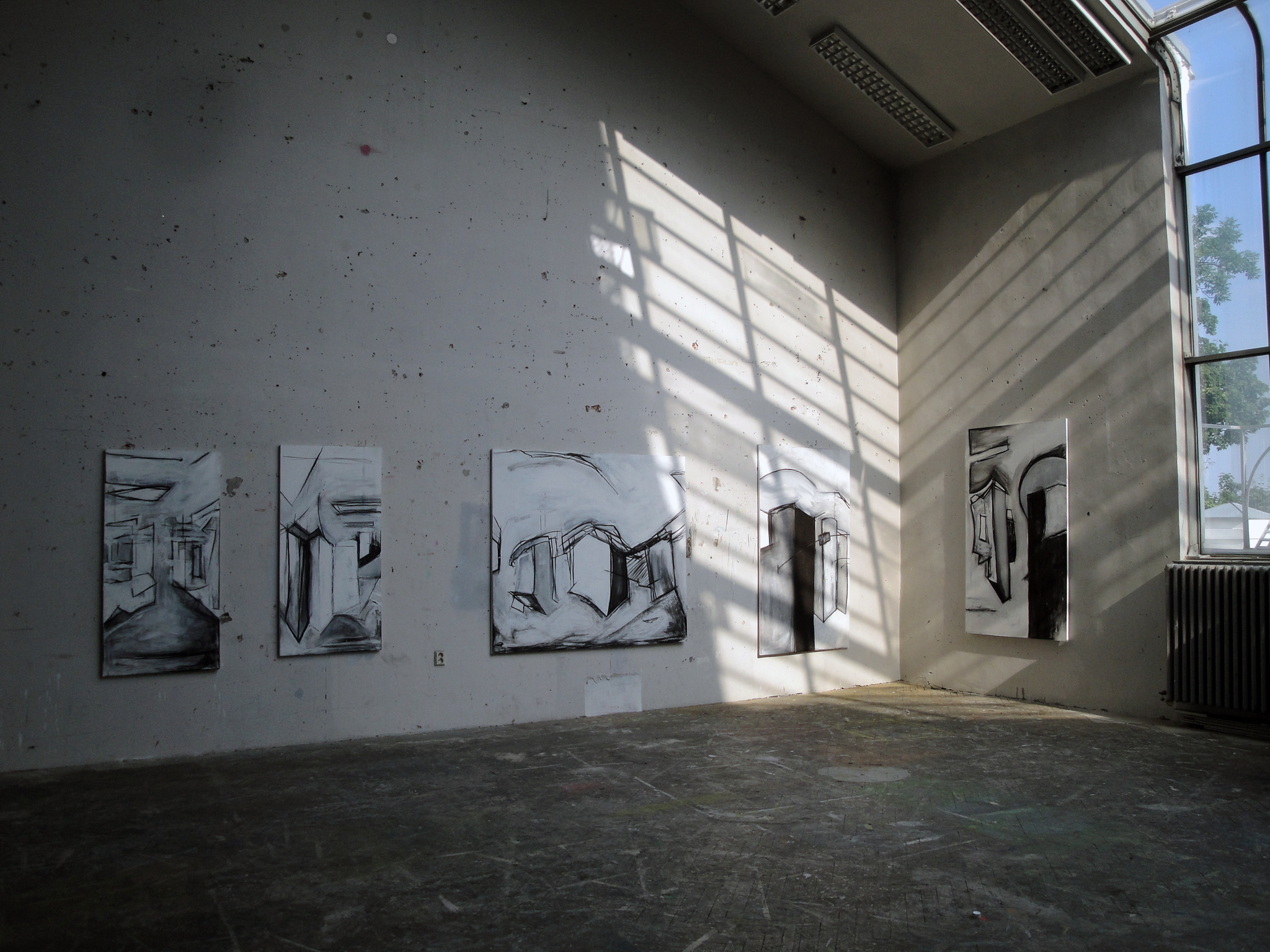 1/1 — PŠTROSSOVA + OSTROVNÍ (MŮJ MUJKŘIŽOVATKA)  Installation image of works created during SAIC summer residency program in conjunction with the Academy of Fine Arts (AVU) in Prague, CZ. Charcoal and acrylic on canvas, 2010.