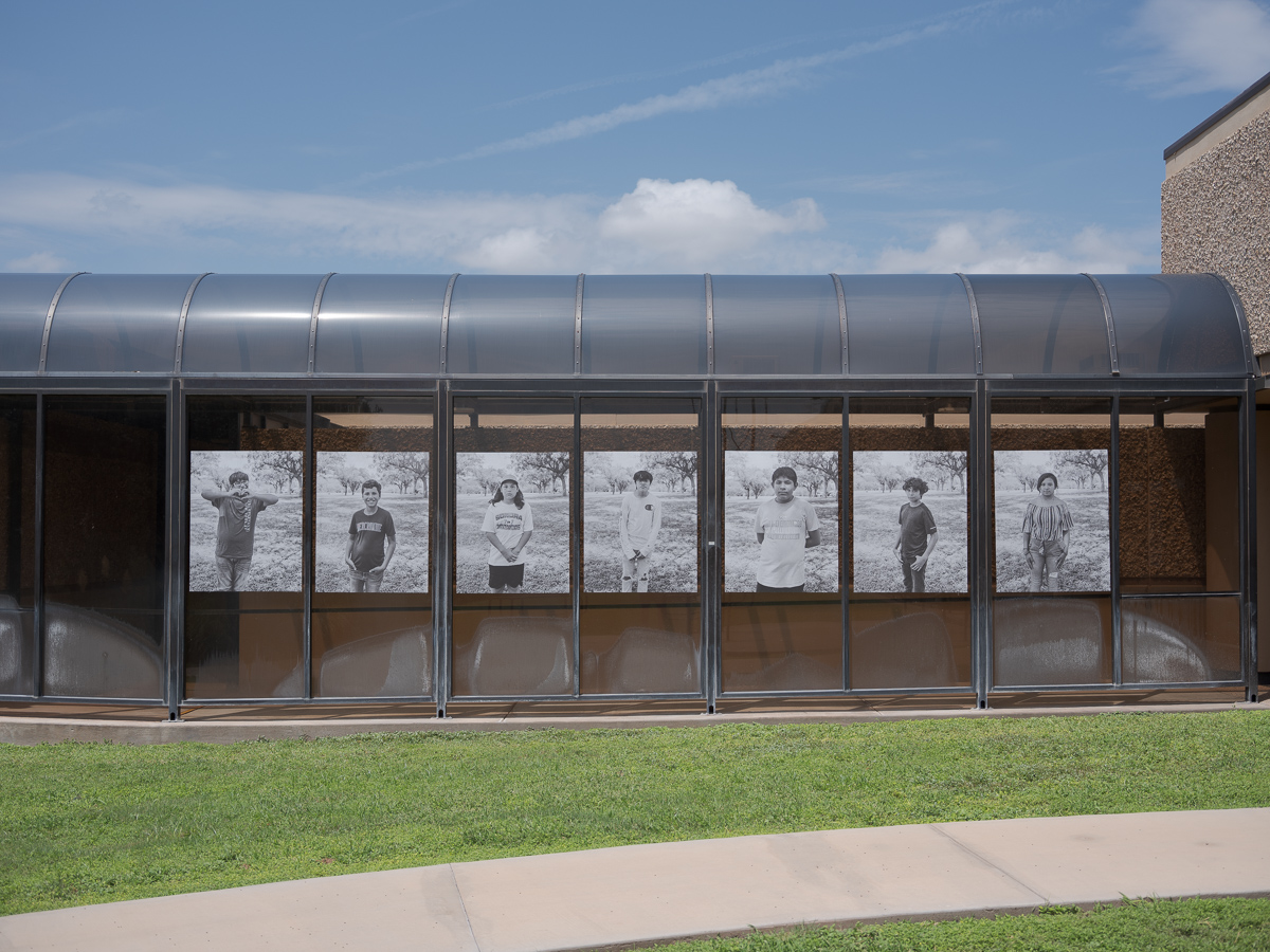 Installation of student portraits at Education Service Center / 2021