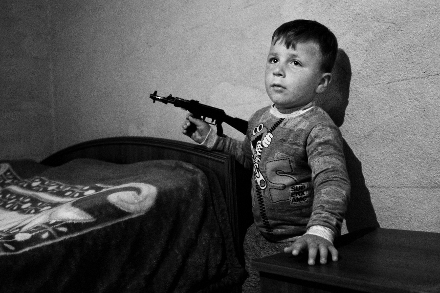 Saaba with toy gun. May 2018