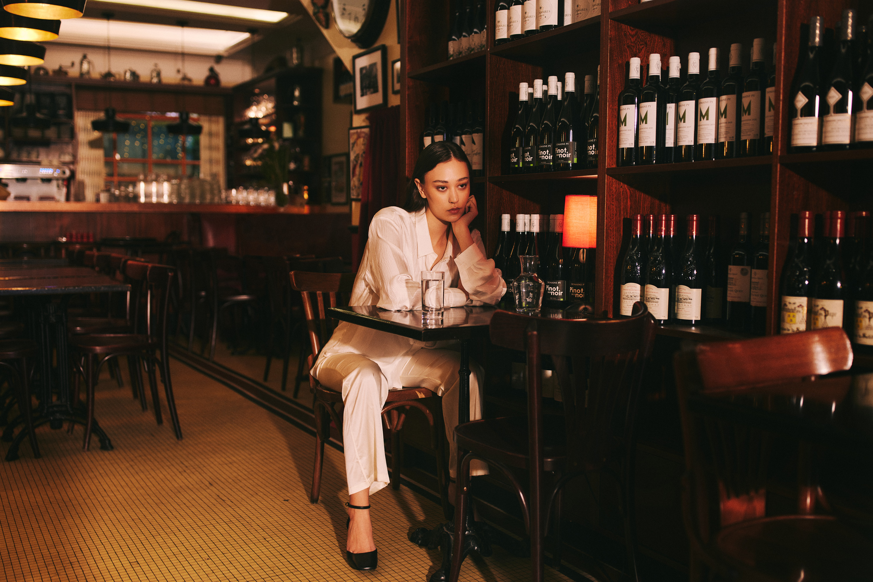 Luxurious fashion editorial photoshoot in Dublin, Ireland, featuring a stunning model in vintage clothes. Photographed in the city's trendy French cafes, this photography showcases the elegance of high-end fashion and the charm of vintage clothing. Captured by a skilled photographer, this editorial is sure to impress.