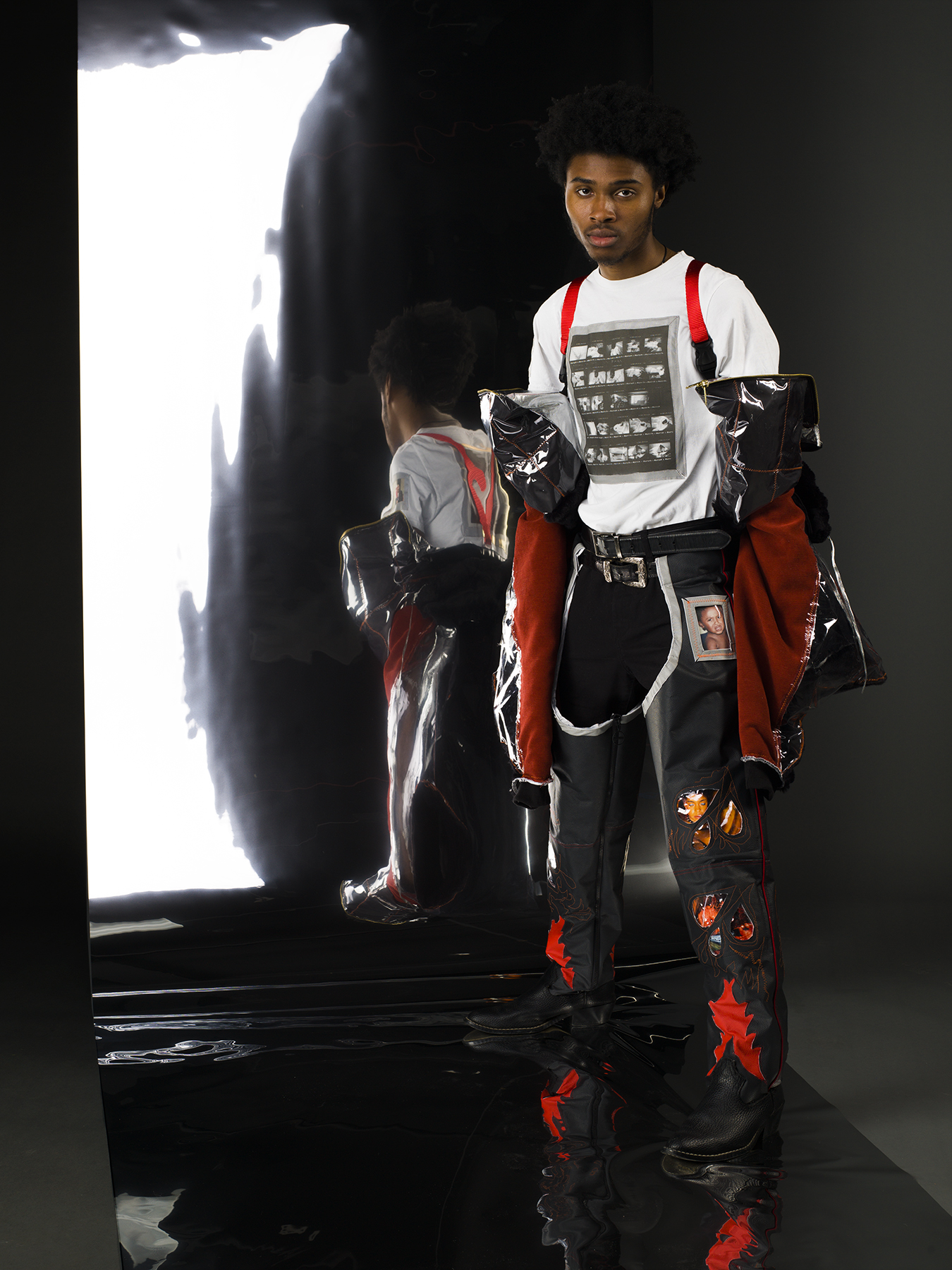 Yasin Parris wearing clothing inspired by his story, for MIRROR Fashion Collection.