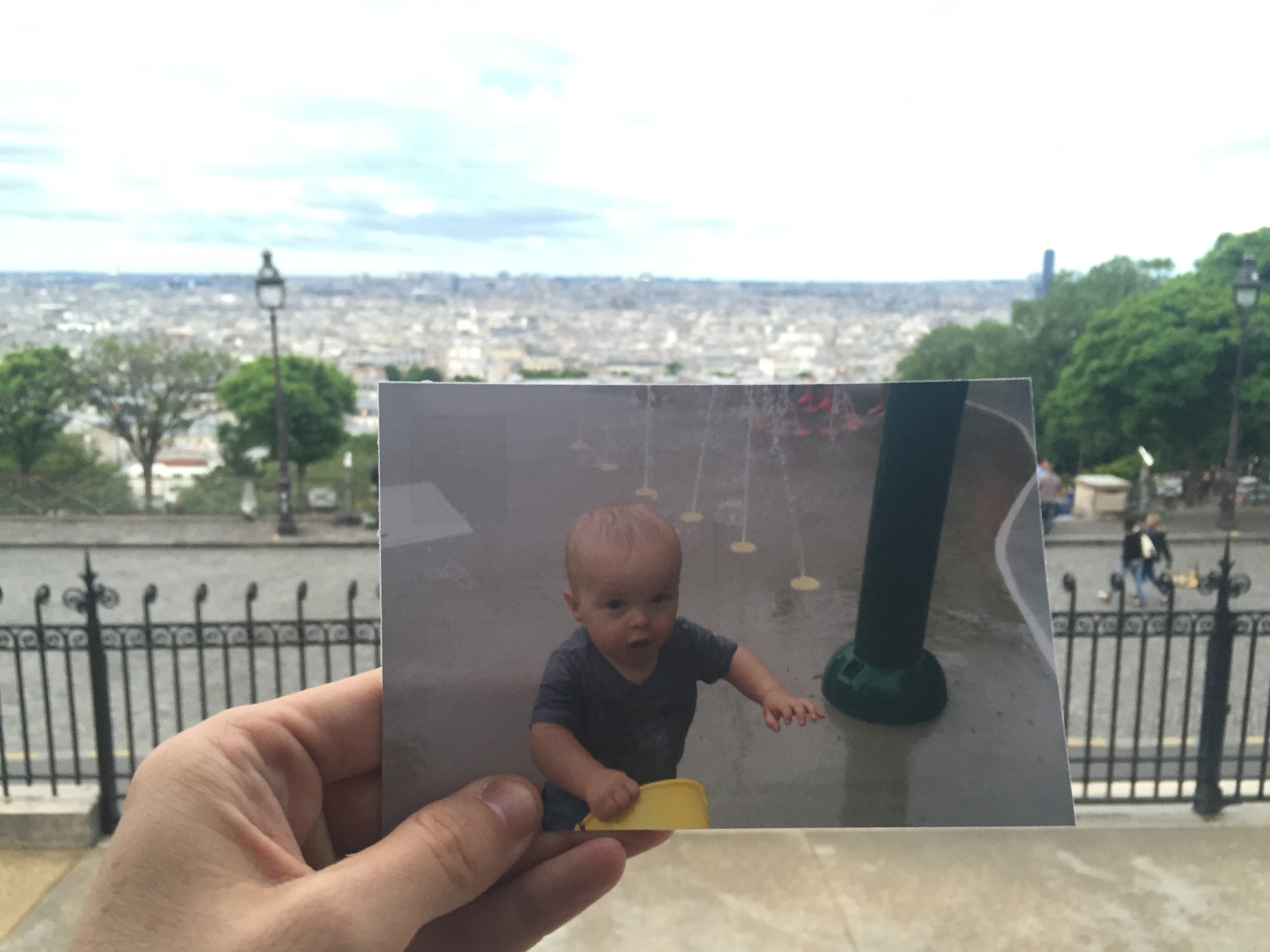 I left this card with a picture of my Nephew playing at a water park. I tucked it in a fence near La Basilique du Sacré Cœur de Montmartre just before it began to rain.