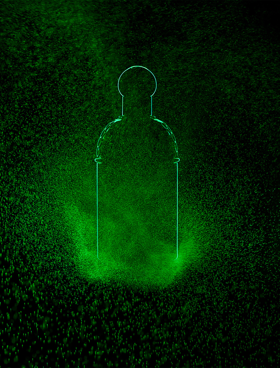 KMA photographer Isabelle Bonjean shoots a close up photograph of a perfume bottle with green smoke for Faux Q Magazine