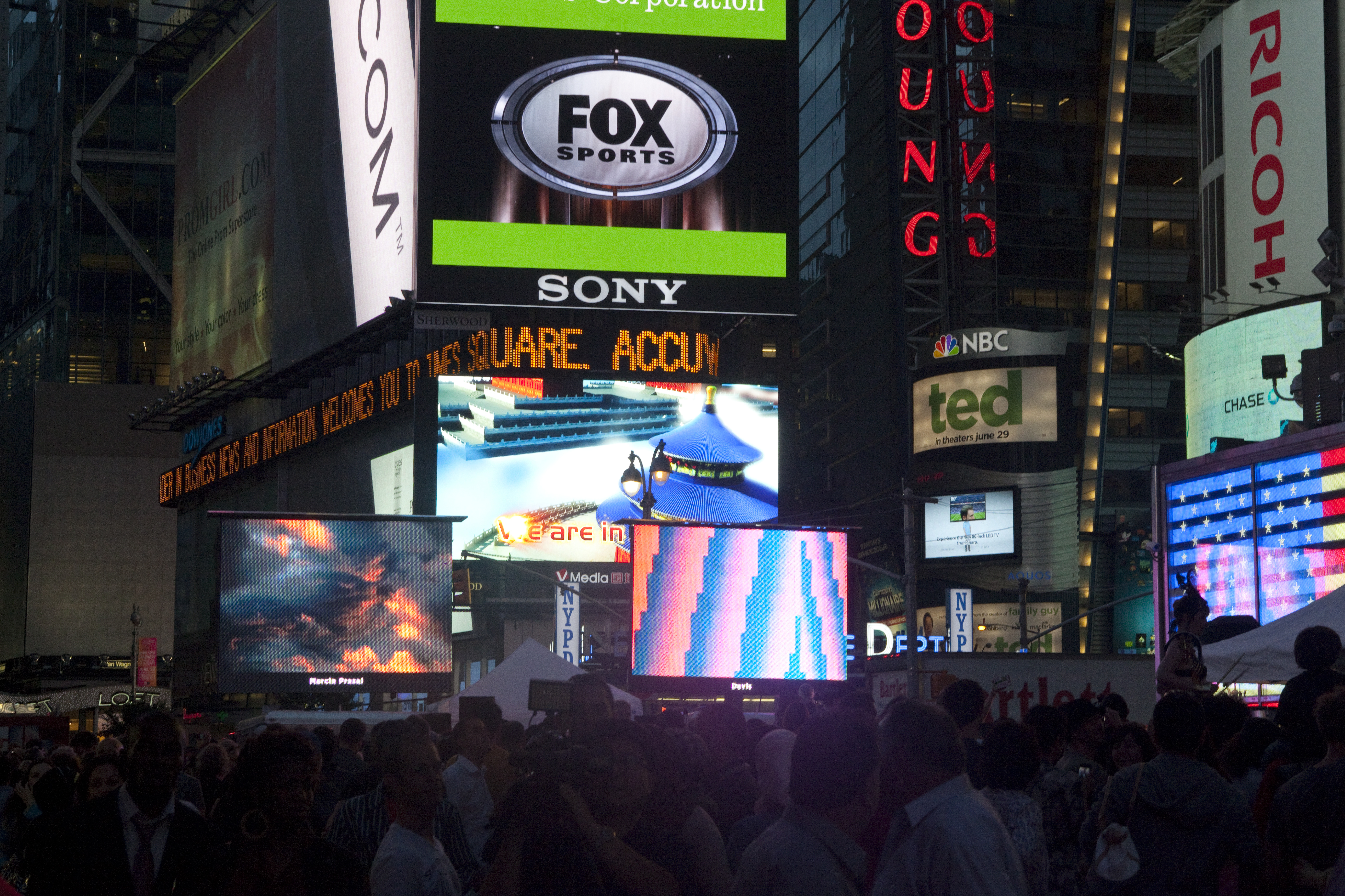 Digital art billboard, Times Square, Nyc, 2012 ( blue and red image at the center)