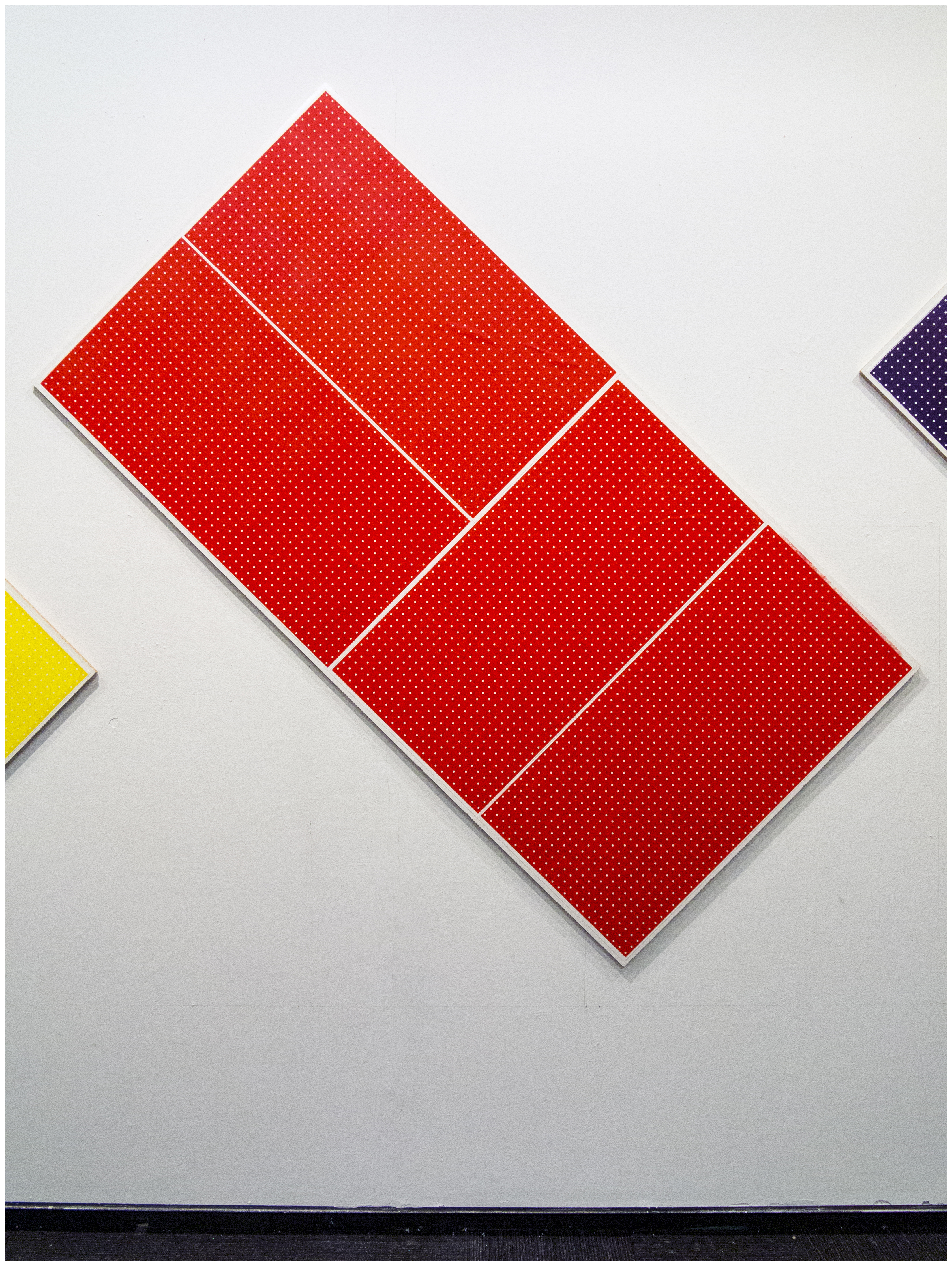 Display of Information - Napthol Scarlet (installation view), 2019Relief prints on Stonehenge paper, melamine49 x 97 x 1.125 in.124.46 x 246.38 x 2.86 cm