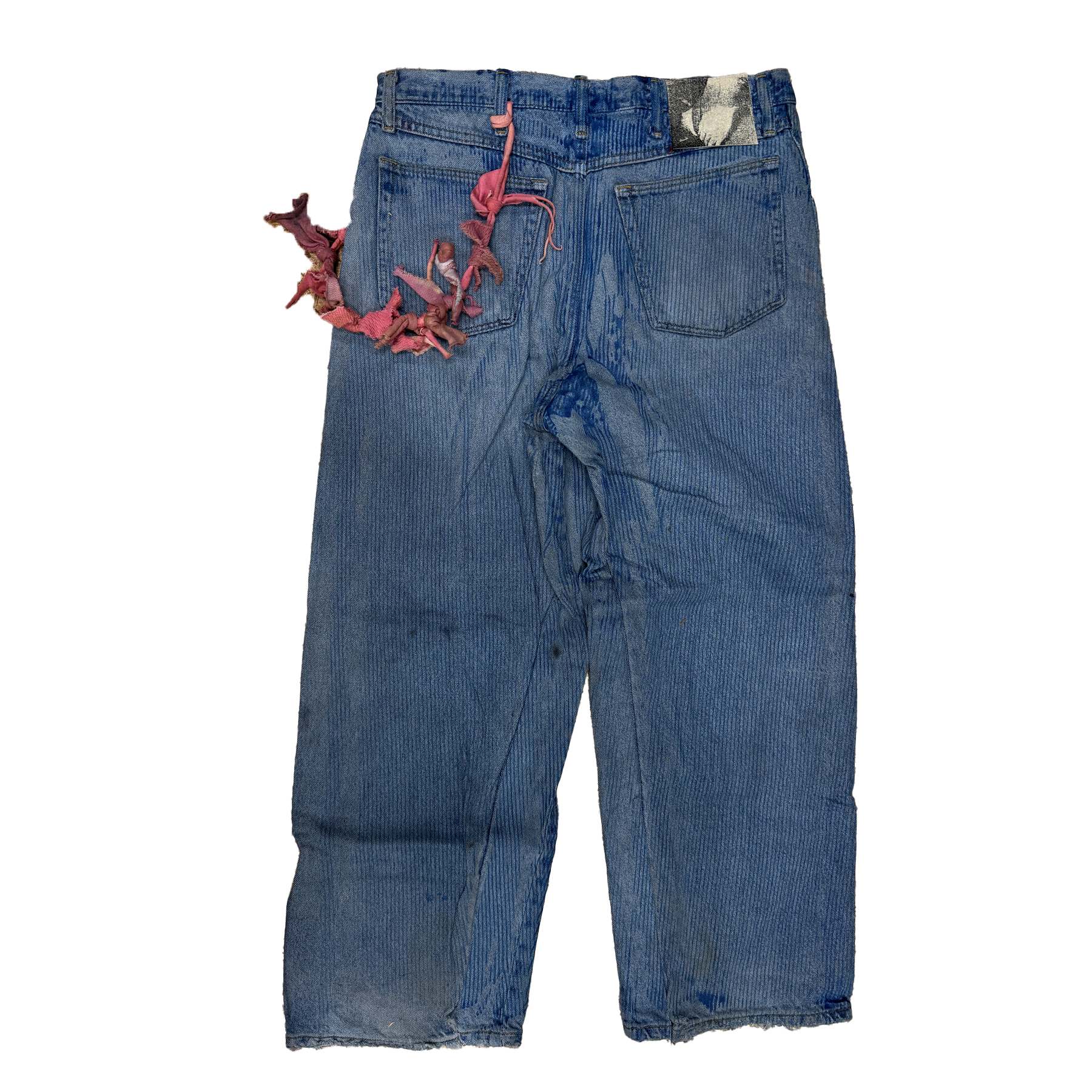 reclaimed vintage surplus denim screen printed with textile ink in snagstripe print. tailored for straight/wide fit. fitted with custom keychain, scrap chain, and leather patches