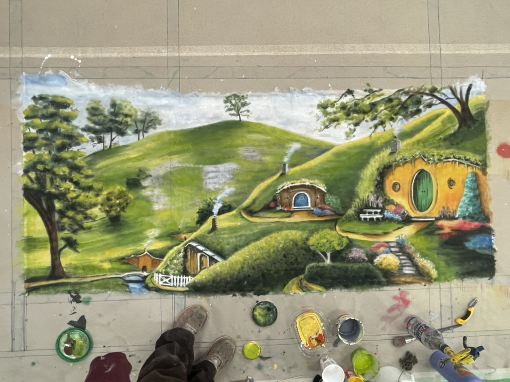Additional layers on trees, landscape, and houses for texture