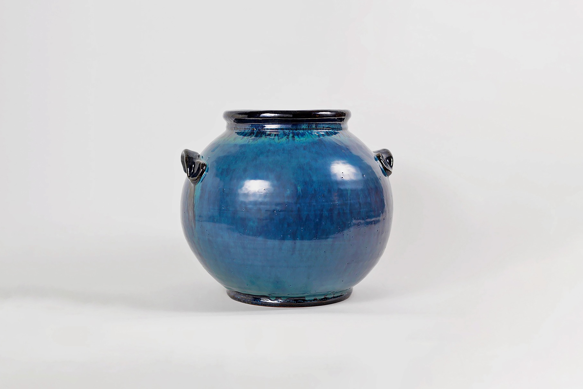 Vessel 2Dark brown stoneware, Tenmoku liner glaze, transparent blue/green glaze, 14&rdquo;x12&rdquo;x12&rdquo; 2023