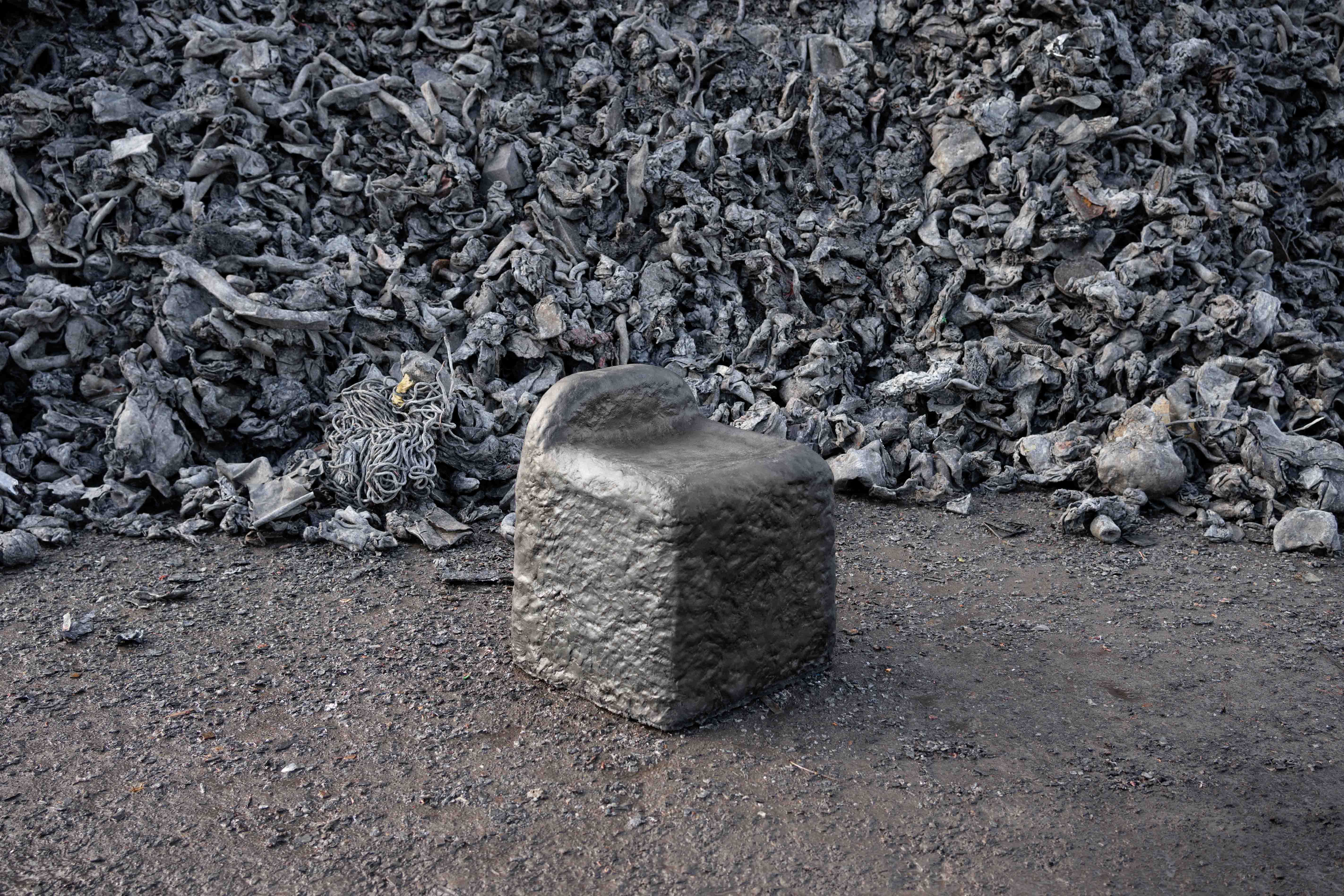 The handformed chair, exploring the slag rheology. The mortar was applied by hand onto internal formwork, in a manner similar to cob-style architecture.