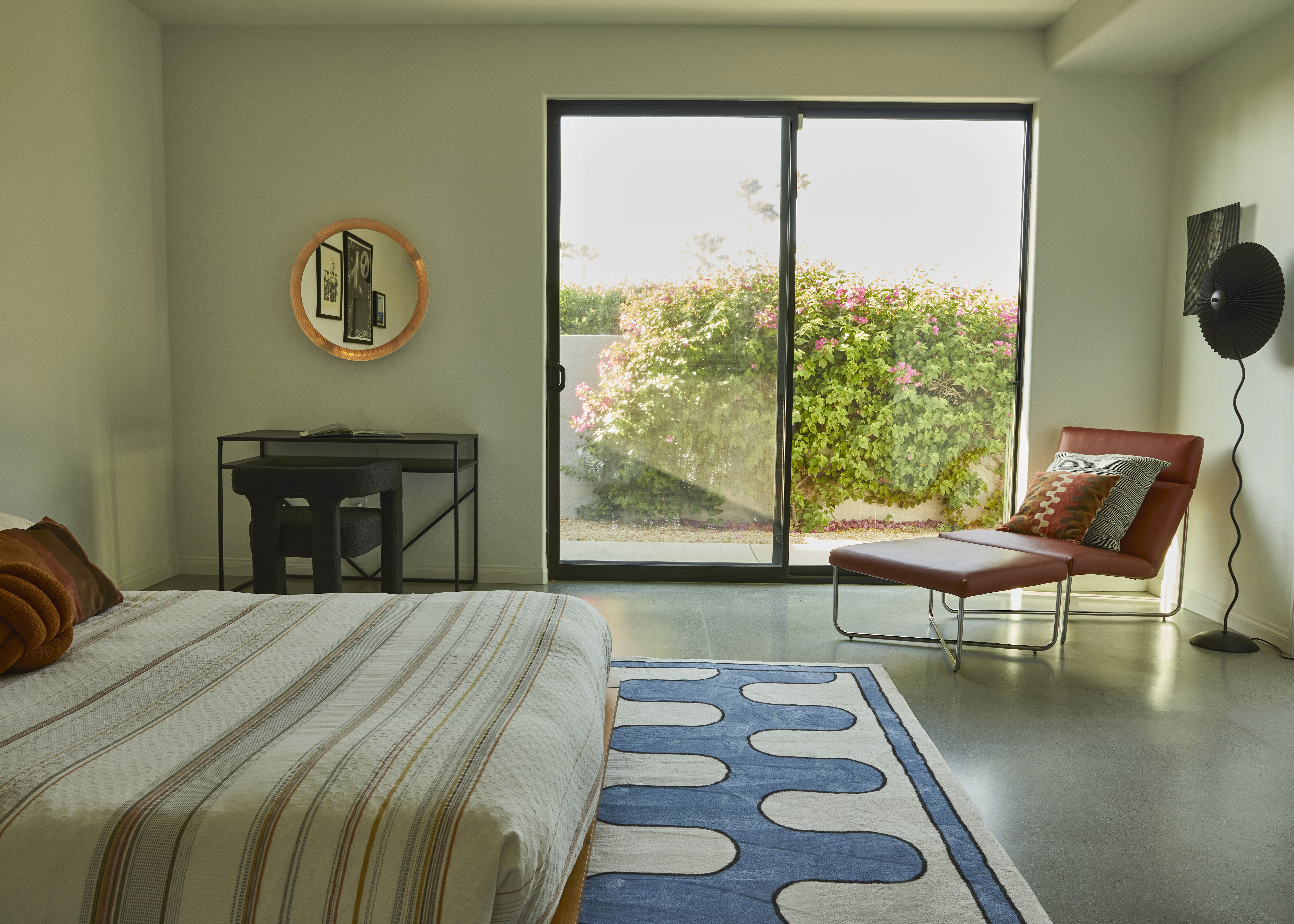 In the bedrooms, floor tiles were removed to reveal raw unfinished concrete which was sanded, patched and lightly polished. The imperfections in the floor make the space feel more authentic and connected to the rugged landscape outside.