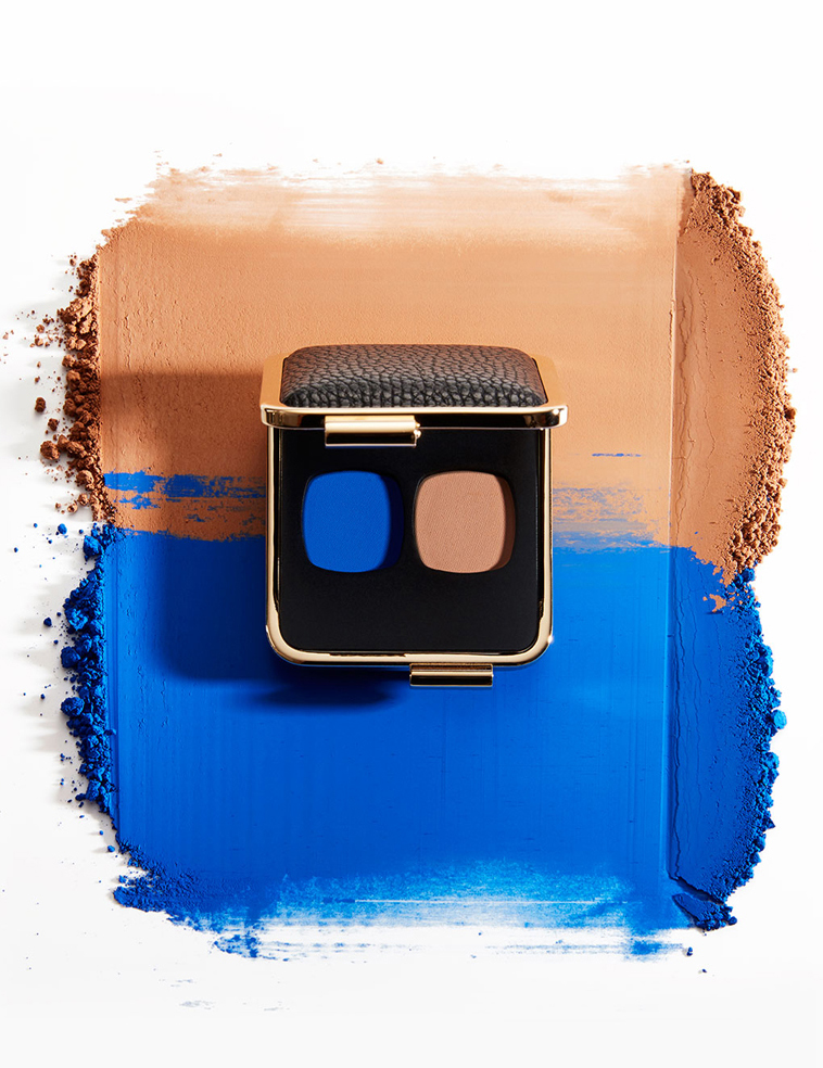 KMA stylist Rachel Haas designs set for photograph of powdery blue and tan eyeshadow with container for Victoria Beckham