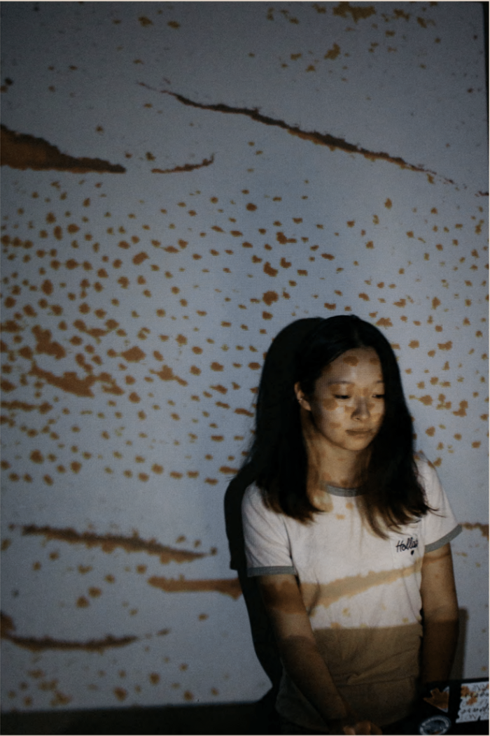 The projection is on my face and skin when I stand in front of the projection.