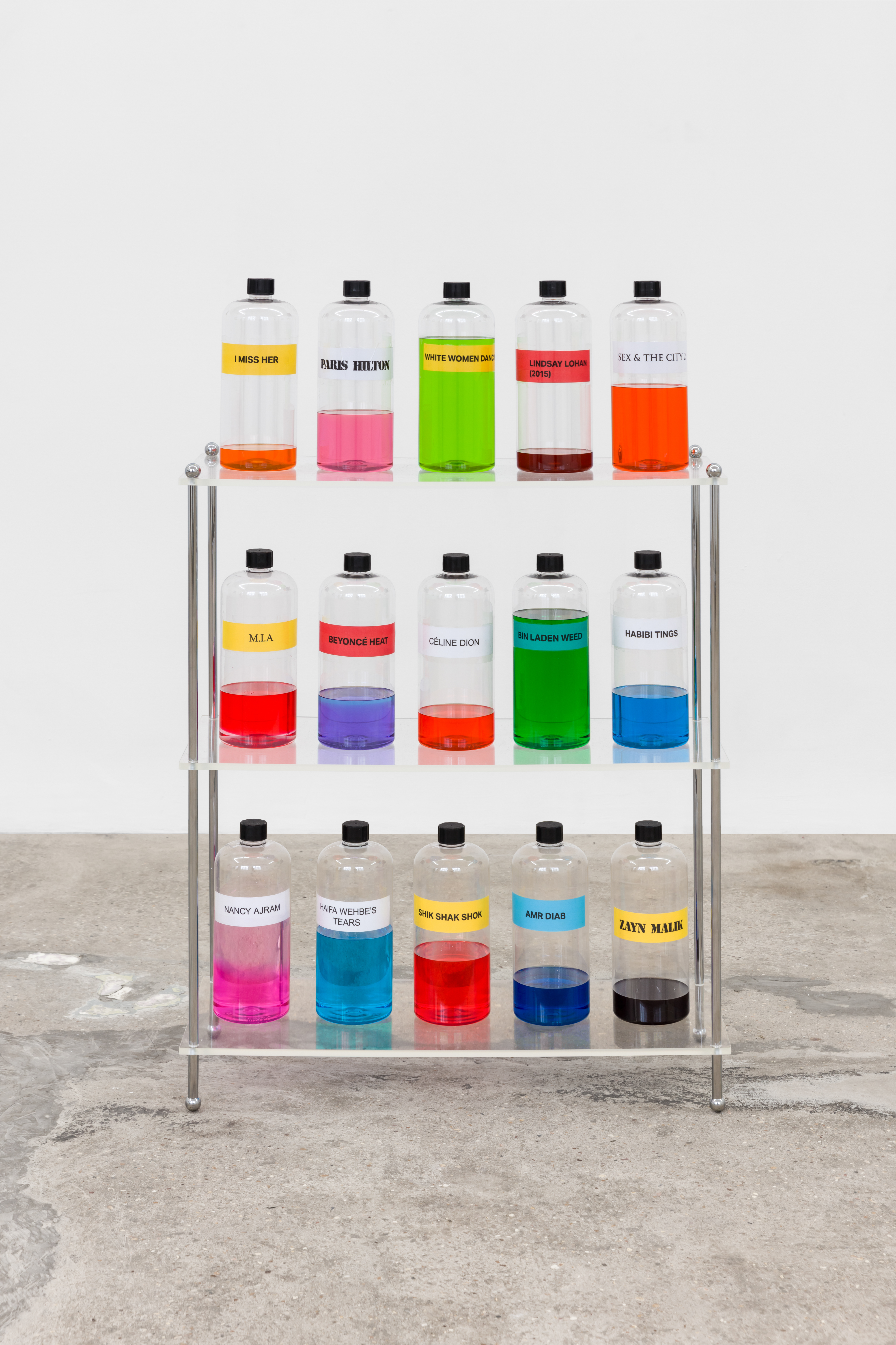 Heart Notes no.1, 2024. Perfume oil, Boston bottles, acrylic shelves, tape, inkjet print, 91 × 60 × 24 cm, 35.8 x 23.6 x 9.5 in. Courtesy the artist and Rose Easton, London. Photo: Jack Elliot Edwards