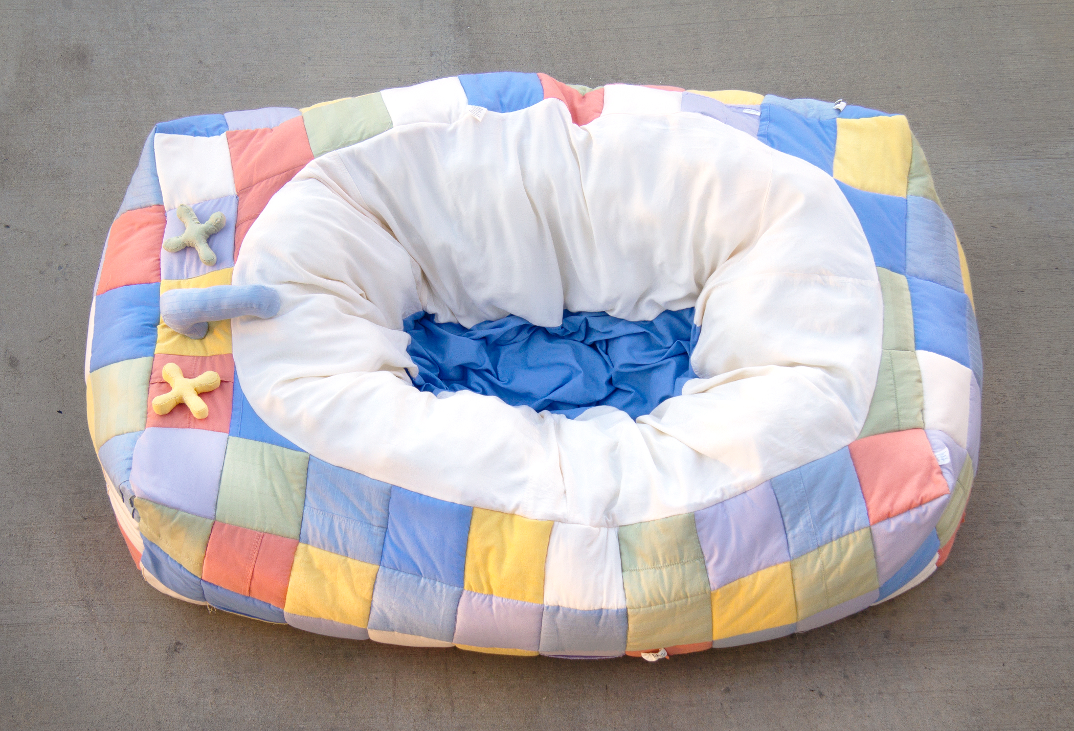 Bathtub, thread, found bed sheets, fiber fill, 65 x 35 x 23 in., 2021